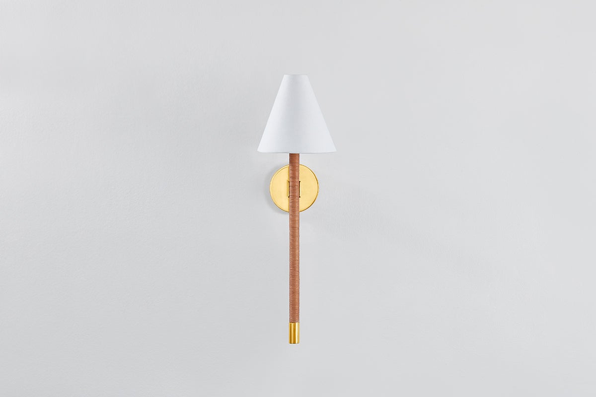 Watkins Wall Sconce in aged brass shown from a second angle to highlight the arm curve and shade silhouette.
