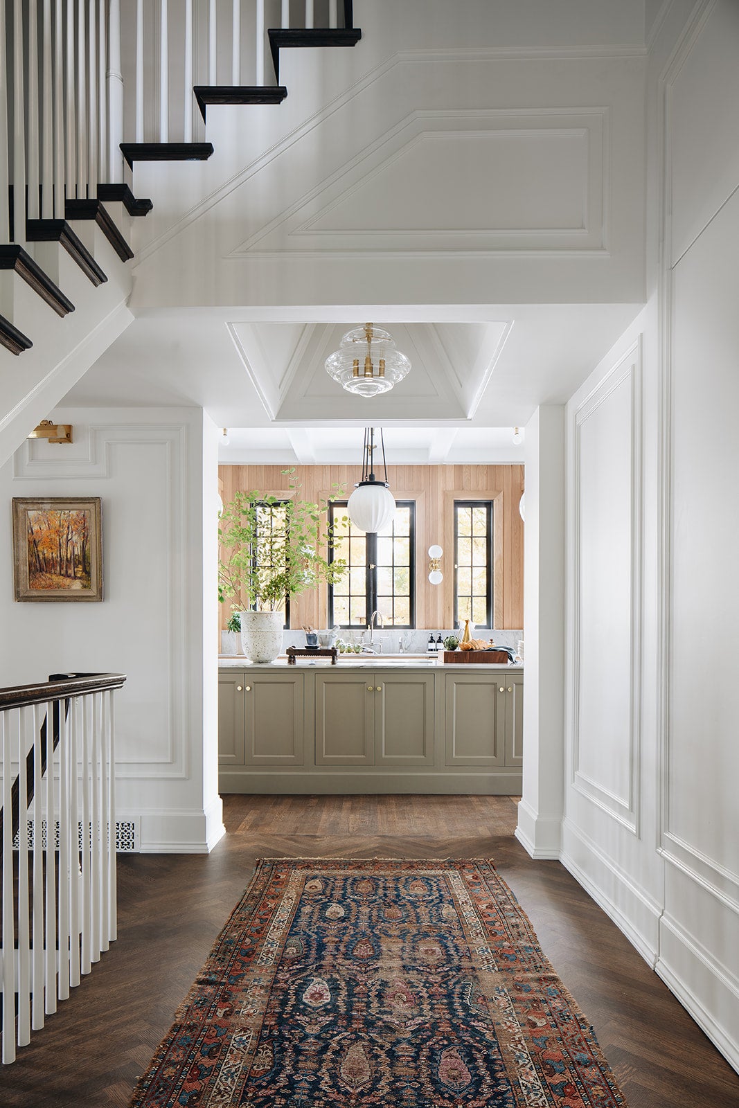 Washington Lantern 20" in aged brass styled in an entry hallway for warm, layered light at Laurie Yapp Home.