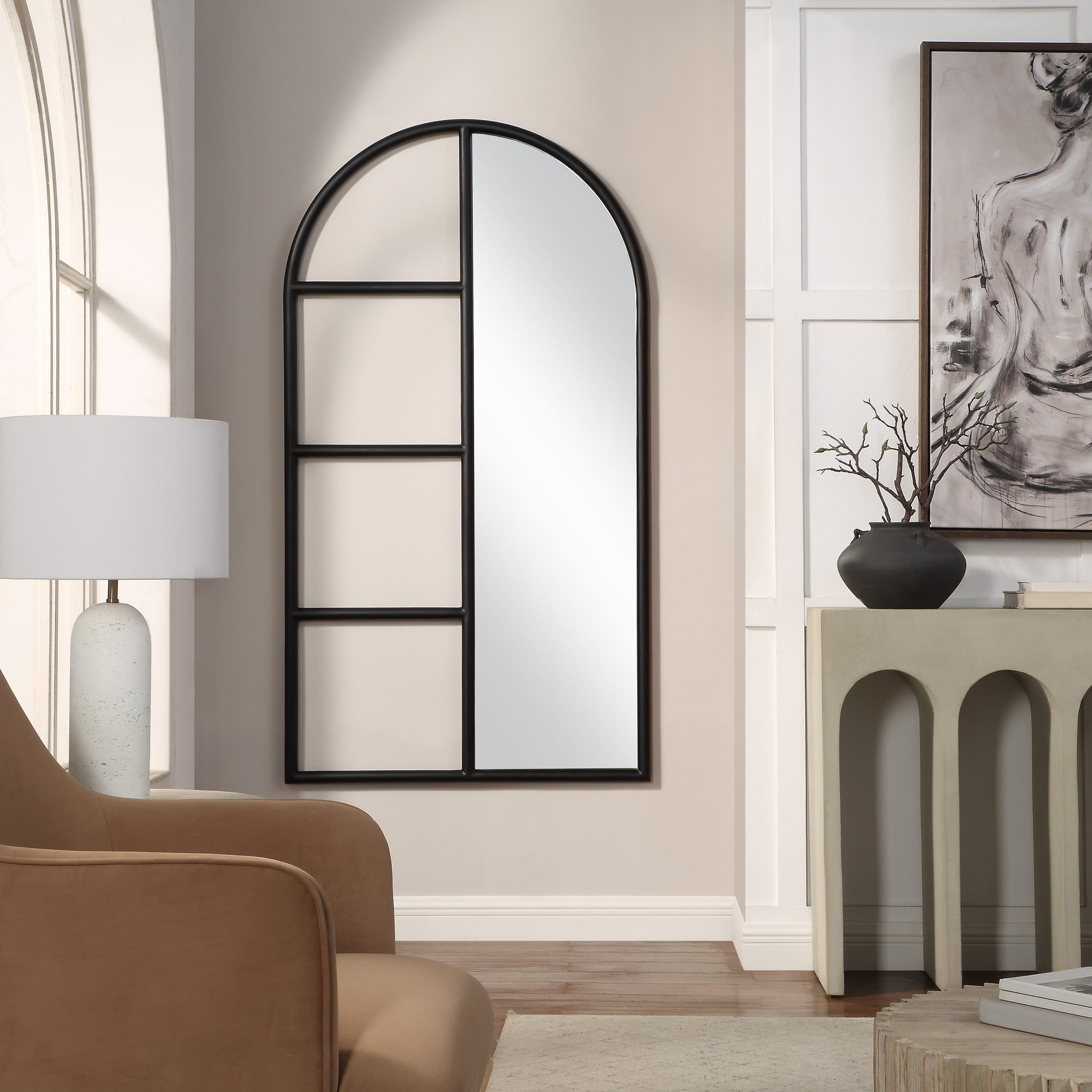 Trellis Mirror by Renwil displayed in a room setting with a lamp and decorative elements.