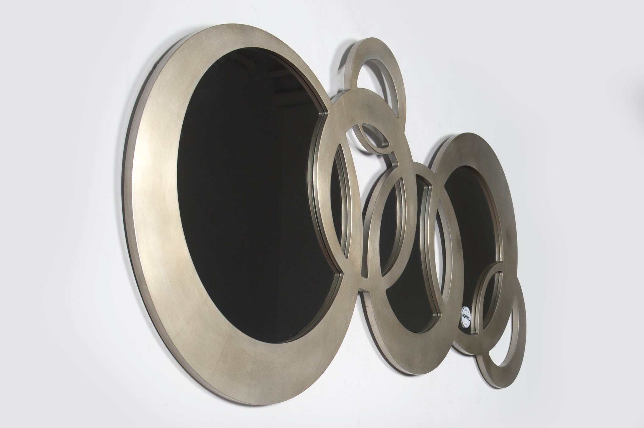Dublin Circle Wall Mirror with a sleek design, showcasing dark circular mirrors framed in a metallic finish.