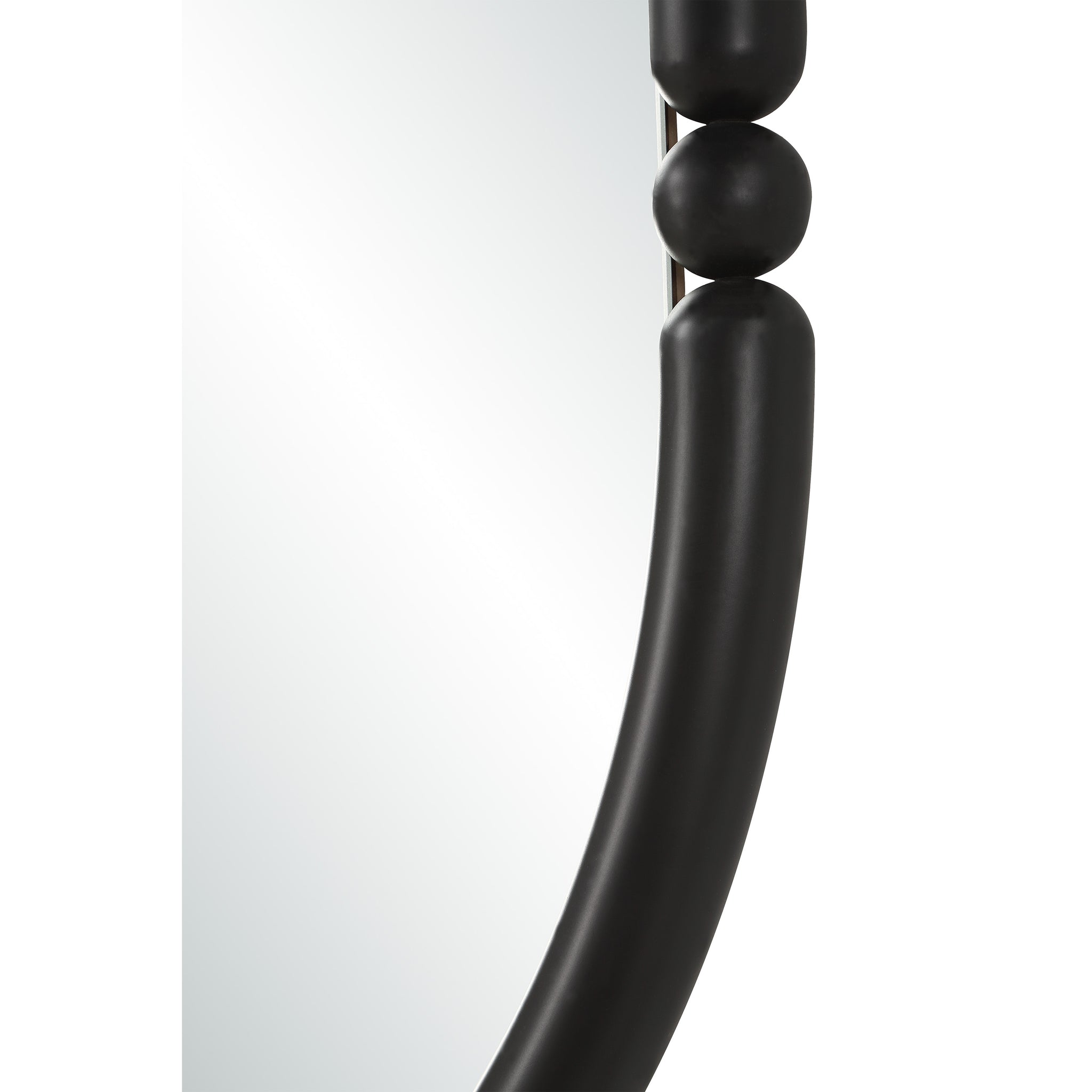Close-up of Ditto mirror by Renwil, showcasing black frame details and round shape.