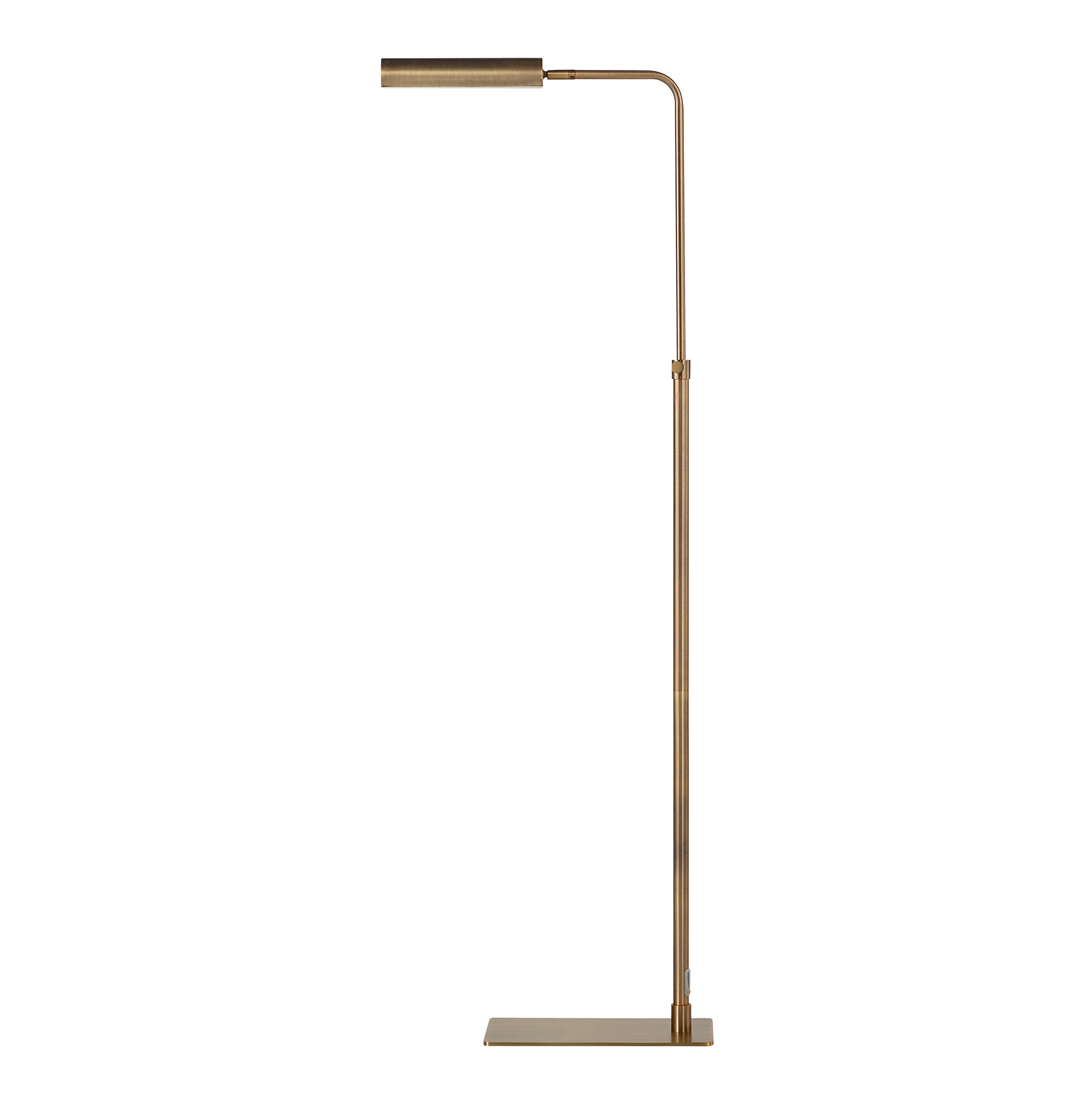 Kane floor lamp by Renwil featuring a minimalist brass structure and angled shade
