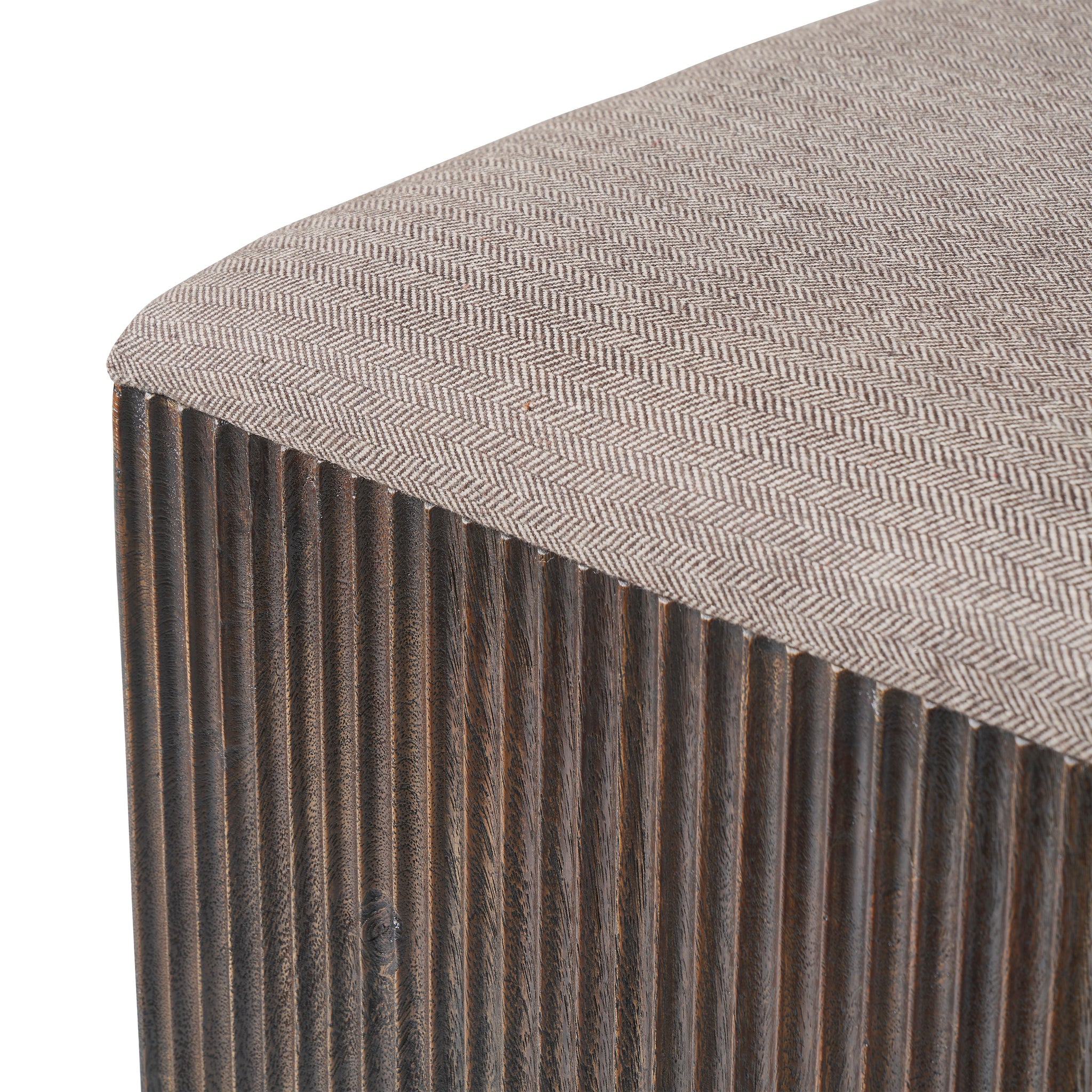 Tristan stool with a herringbone patterned fabric top and dark wood base.
