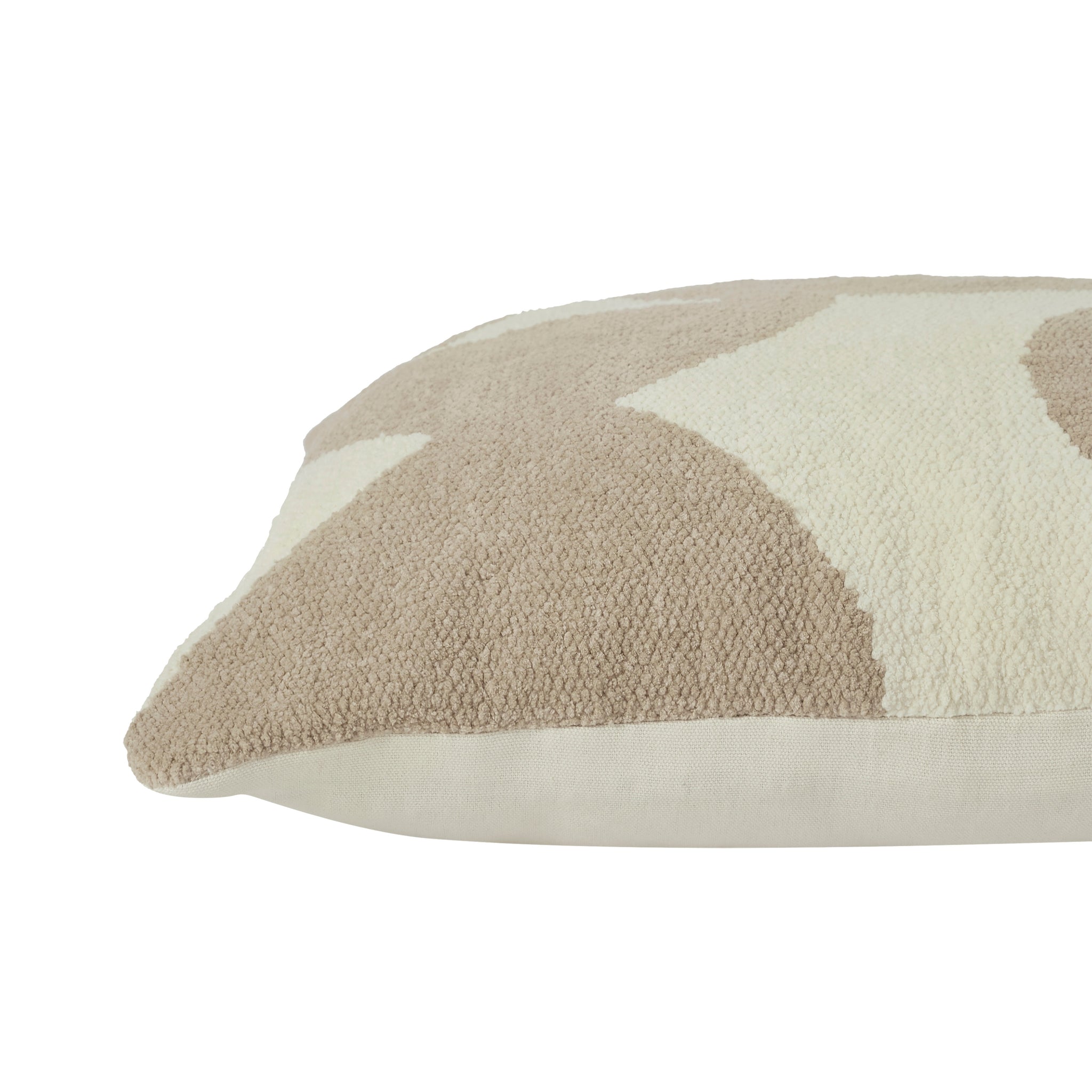Ferla Indoor Pillow featuring a textured beige and cream geometric pattern, side view showcasing plush material