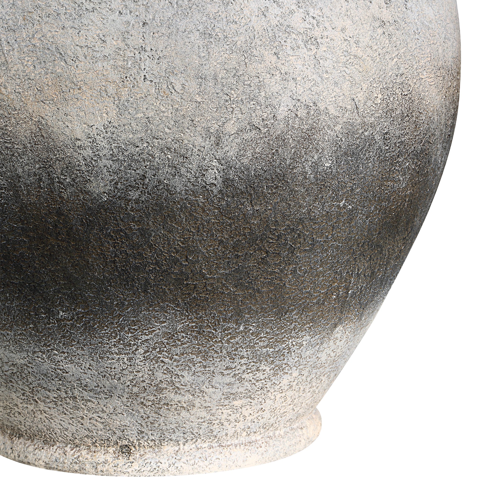 Close-up of Betulla Table Lamp's gray ceramic base showcasing a textured finish.