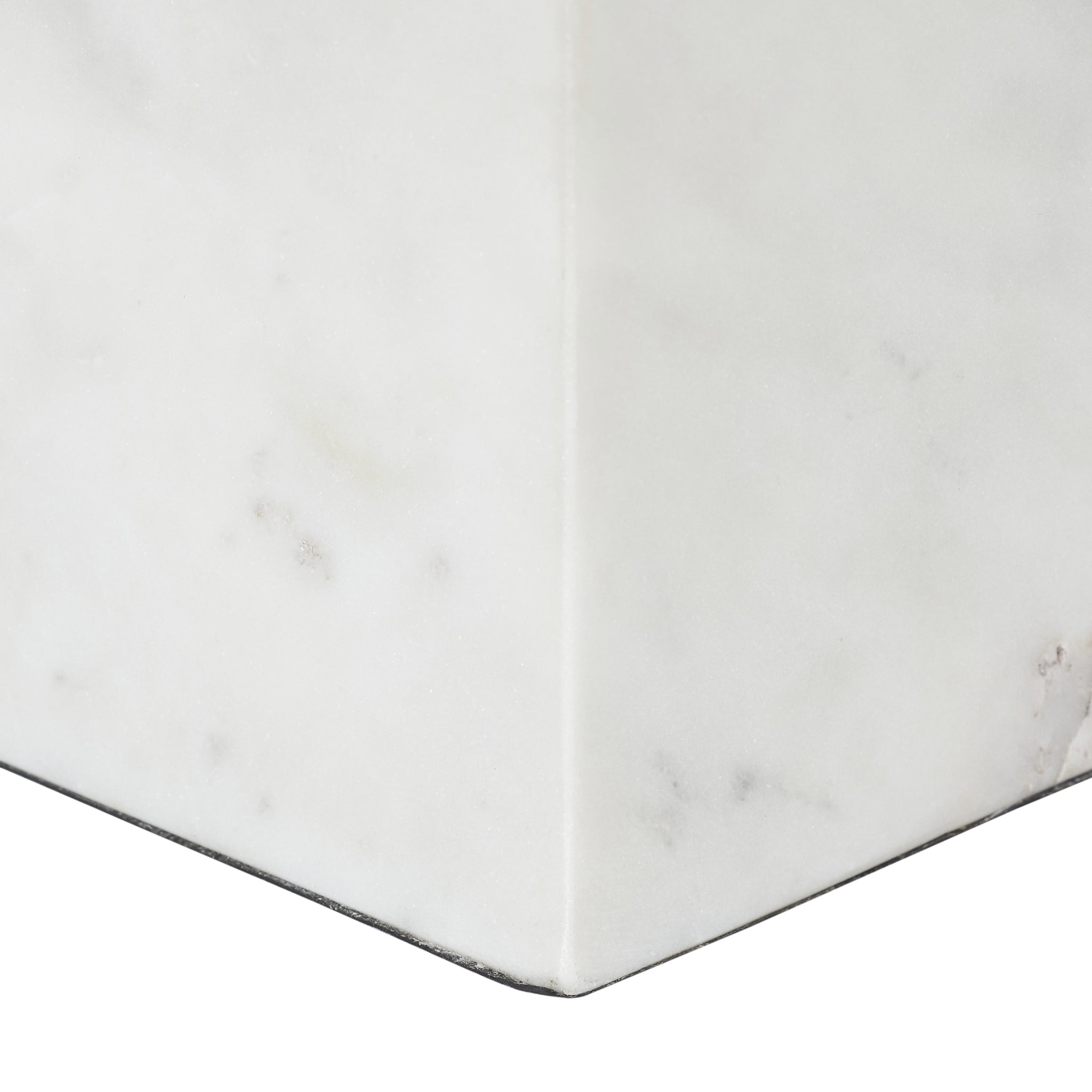 Close-up of Symmetra statue in white marble, showcasing corner detail