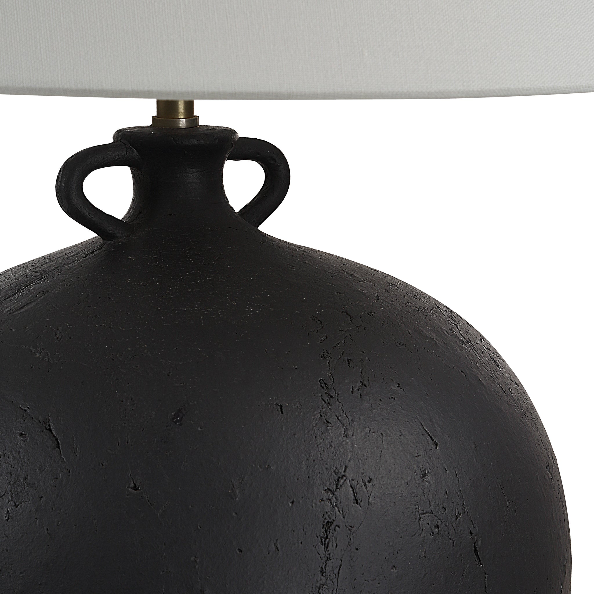 Close-up of Alicia Table Lamp showing black textured base and white shade