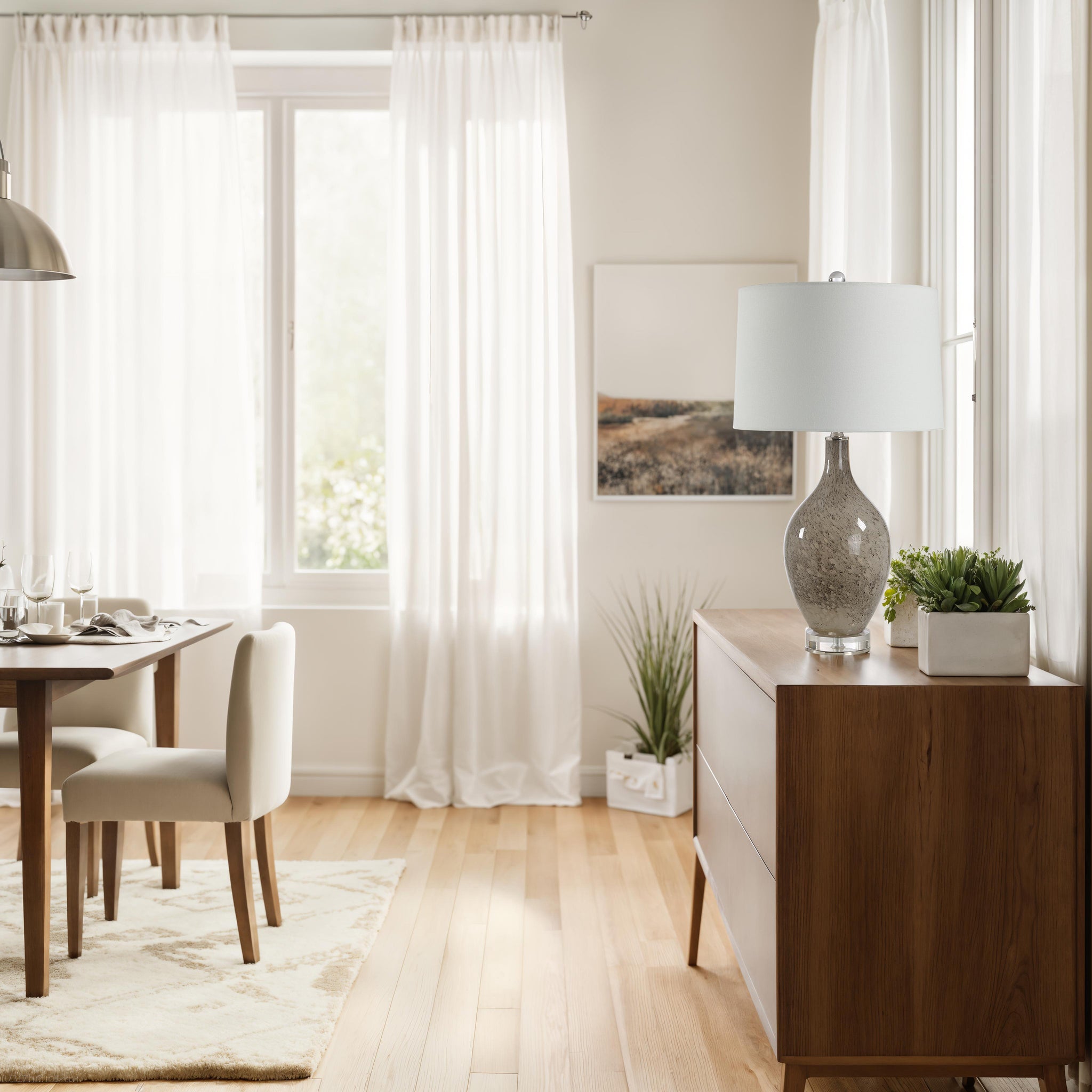 Vienne Table Lamp on a wooden sideboard in a bright dining room setting.