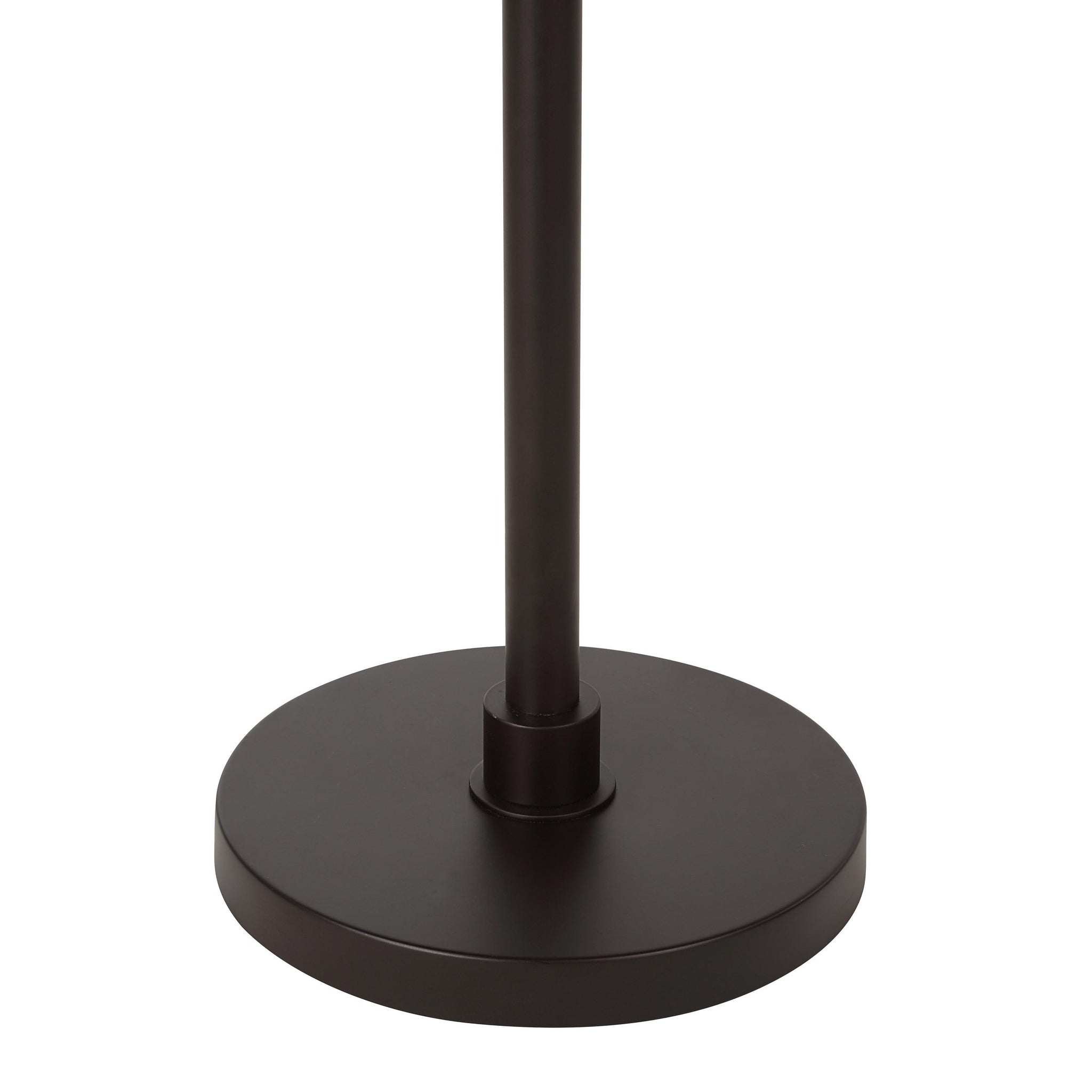 Base of Danae floor lamp showing a round black metal base and pole.