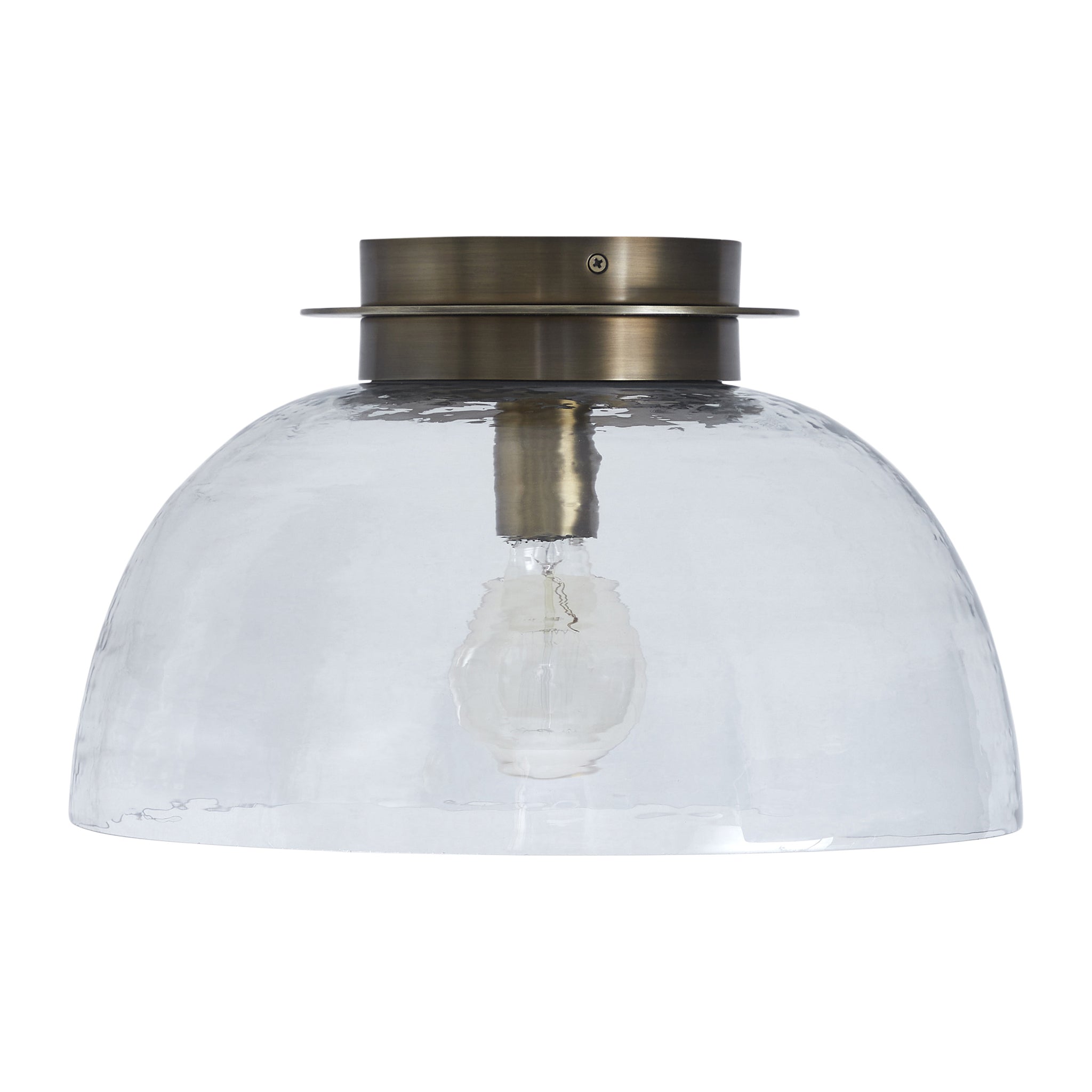 Liliane Flush Mount light with a clear glass dome and brass fixture, top view.