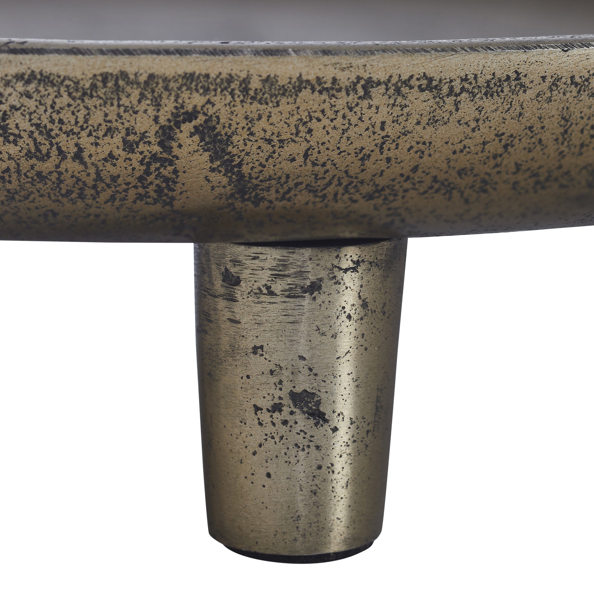 Close-up of the Kaleido Indoor Cast Aluminum Tray highlighting its leg and textured rim