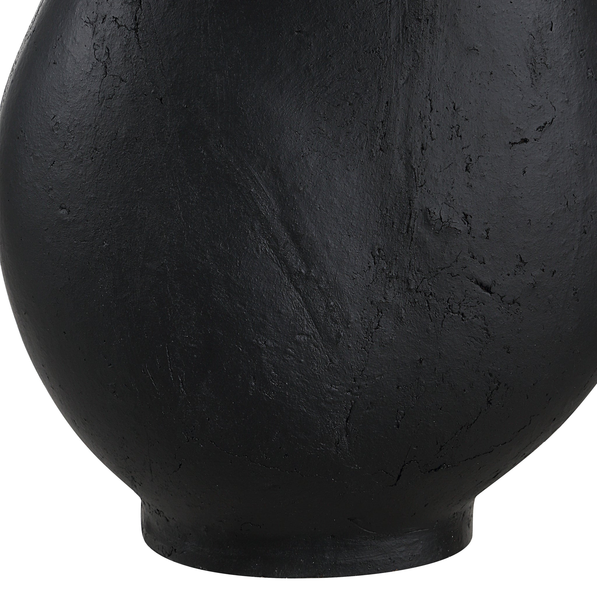 Close-up of Sotiria Table Lamp's black textured base