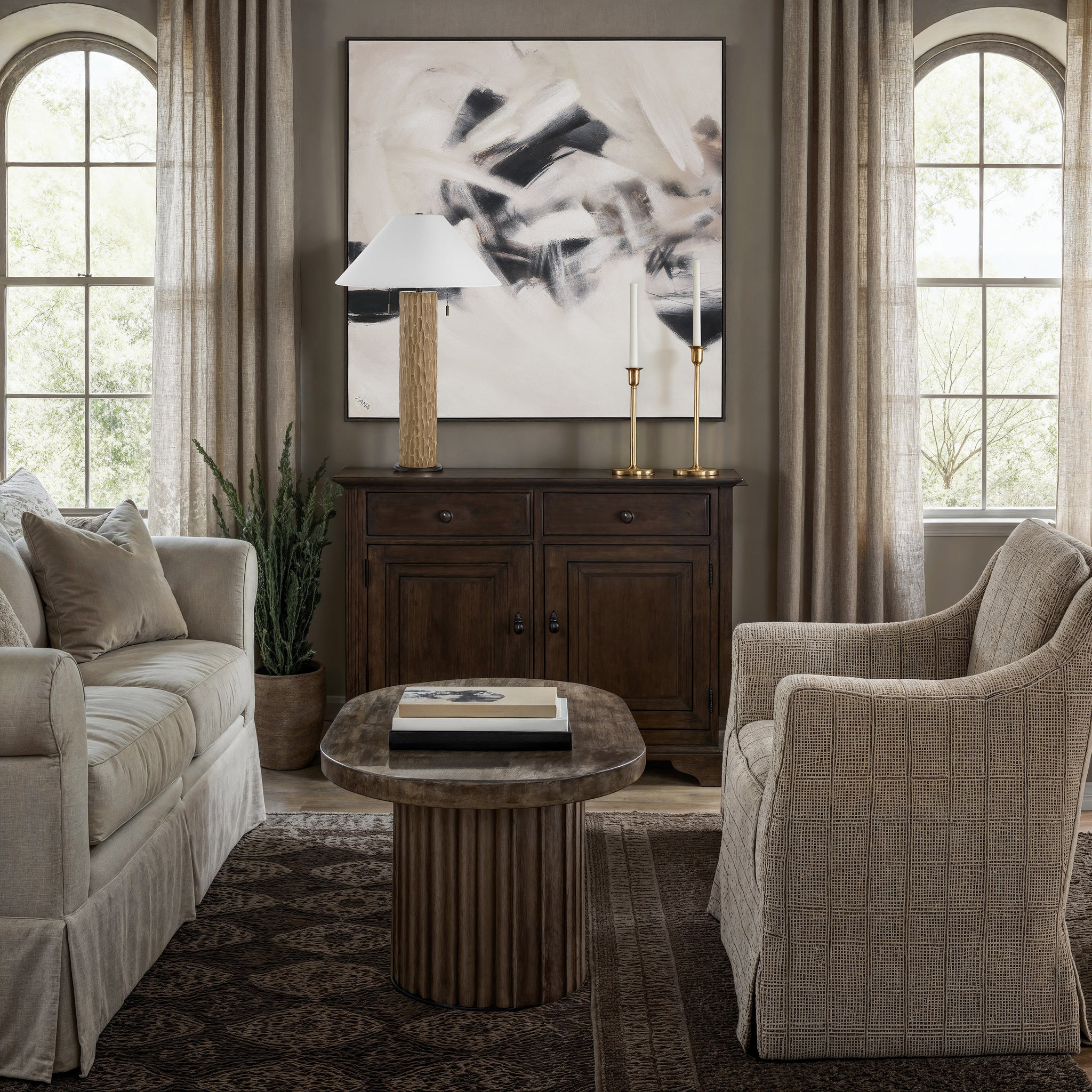Clary canvas art featuring abstract black and beige design in a modern living room setting