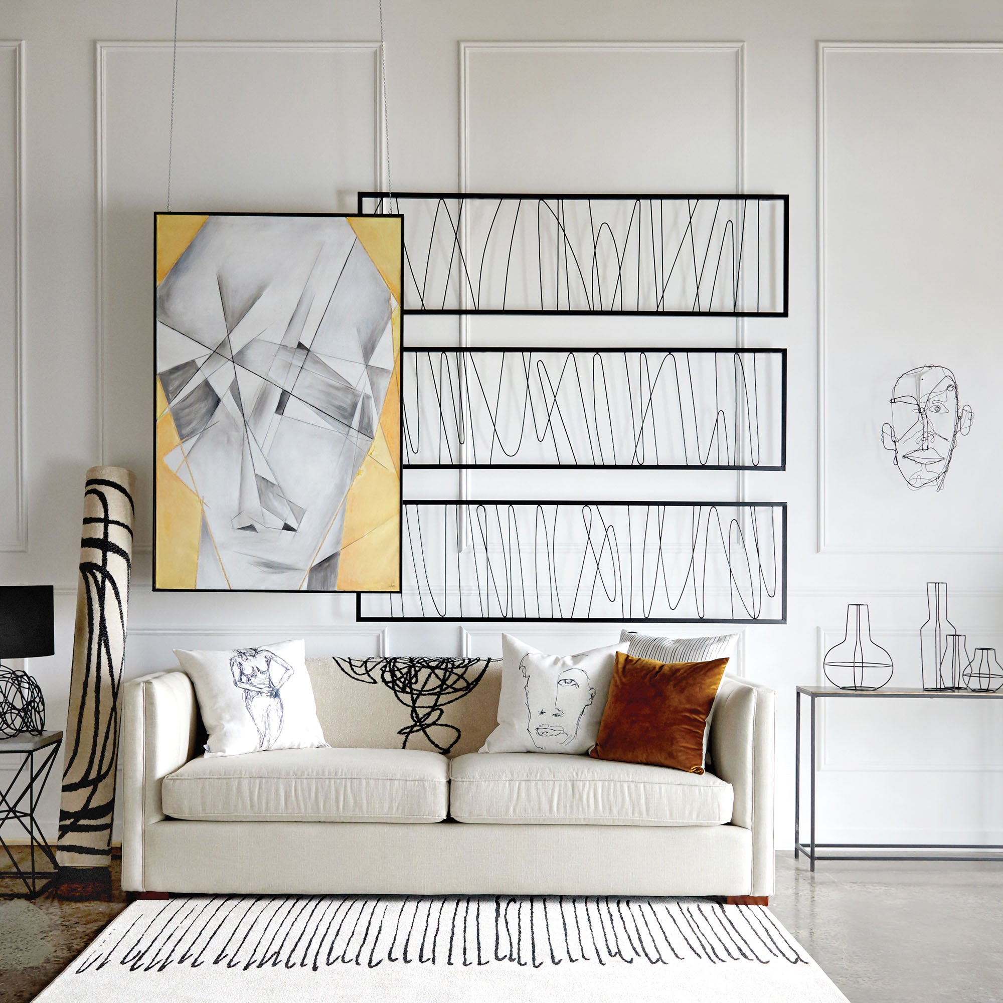 Studio Line - Linear Wall Art displayed in a modern living room setting with a sofa and decorative elements.