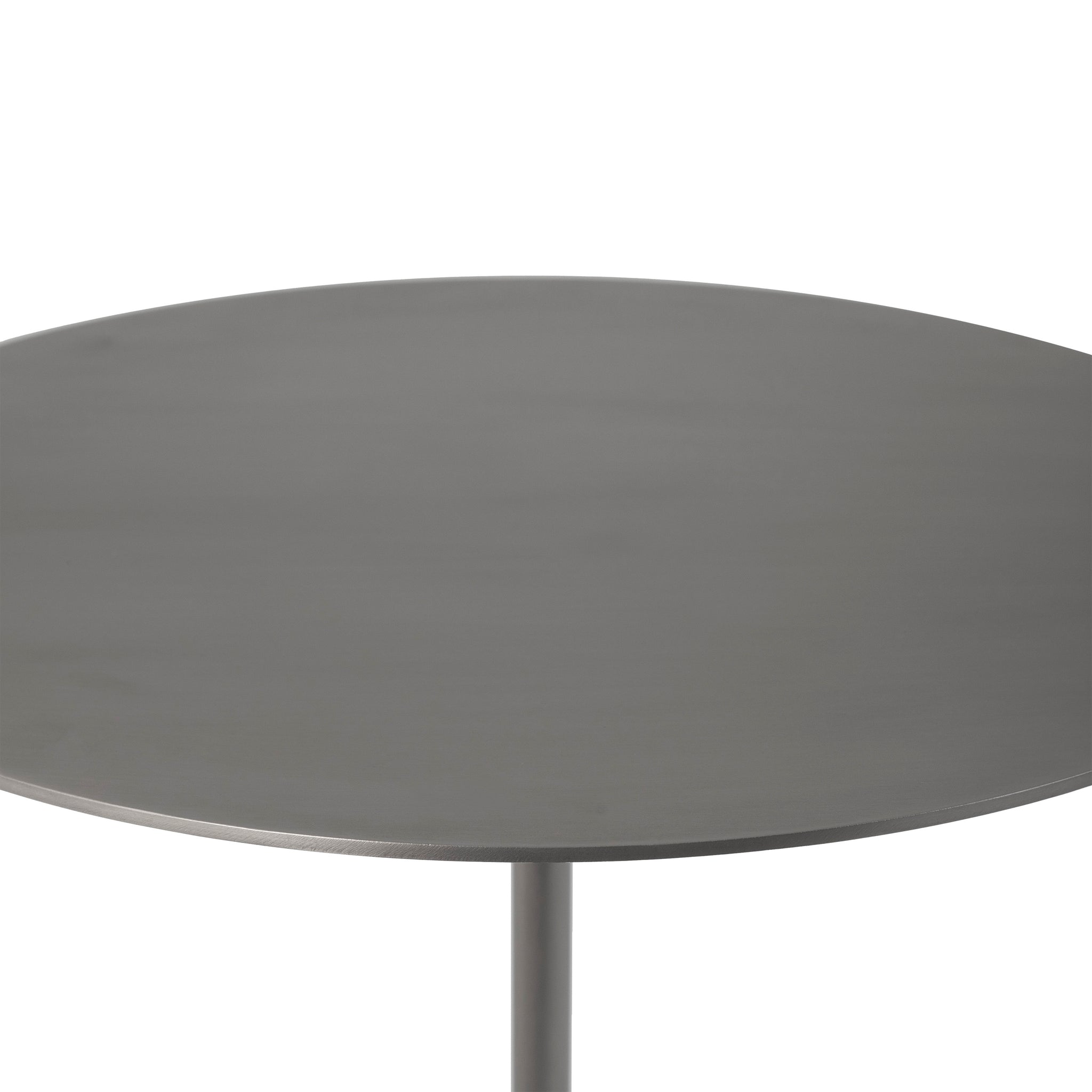 Top view of Aiden side table showcasing its smooth round metal surface.