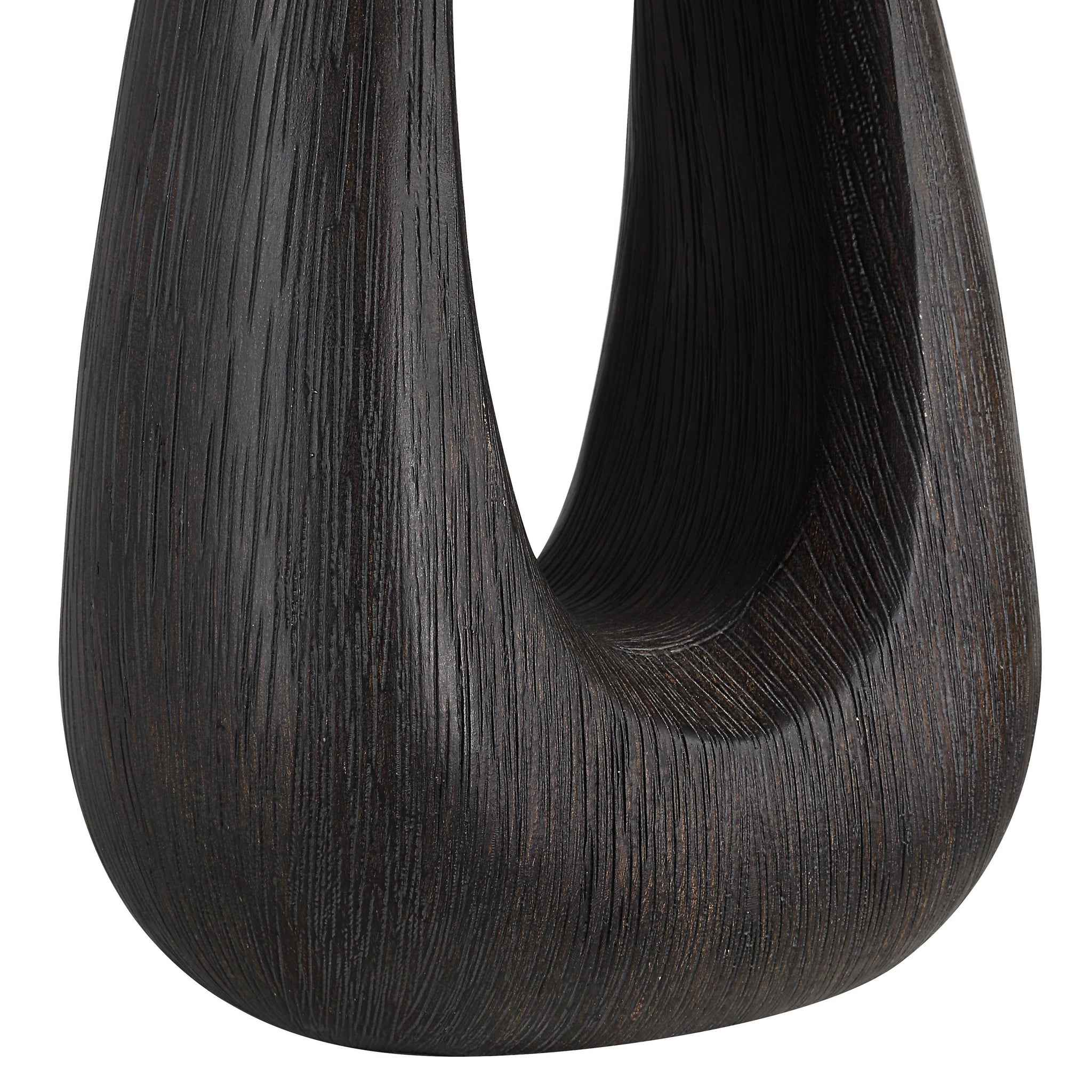 Close-up of the dark wood base of the Beckham Table Lamp showcasing its textured finish