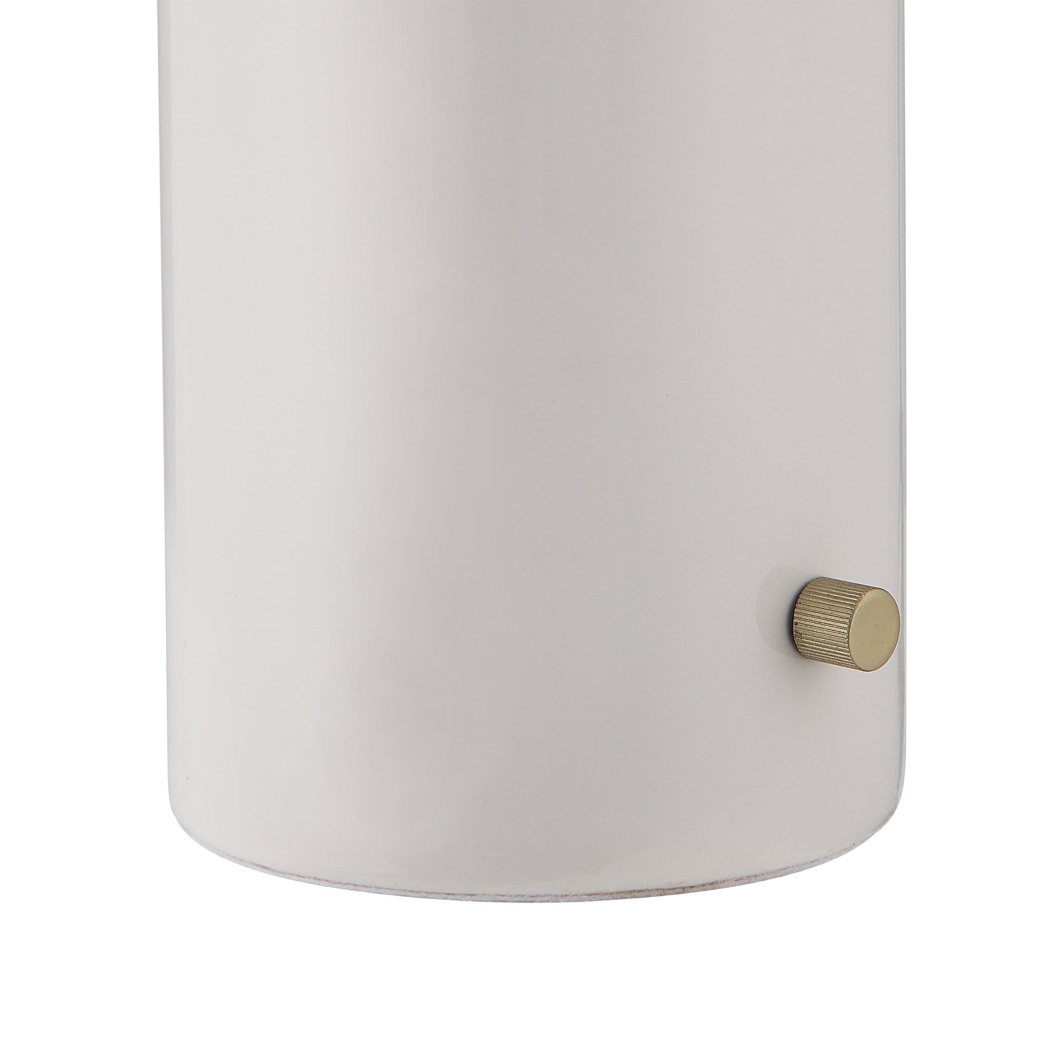 Close-up of Solero Table Lamp's white base with a gold knob