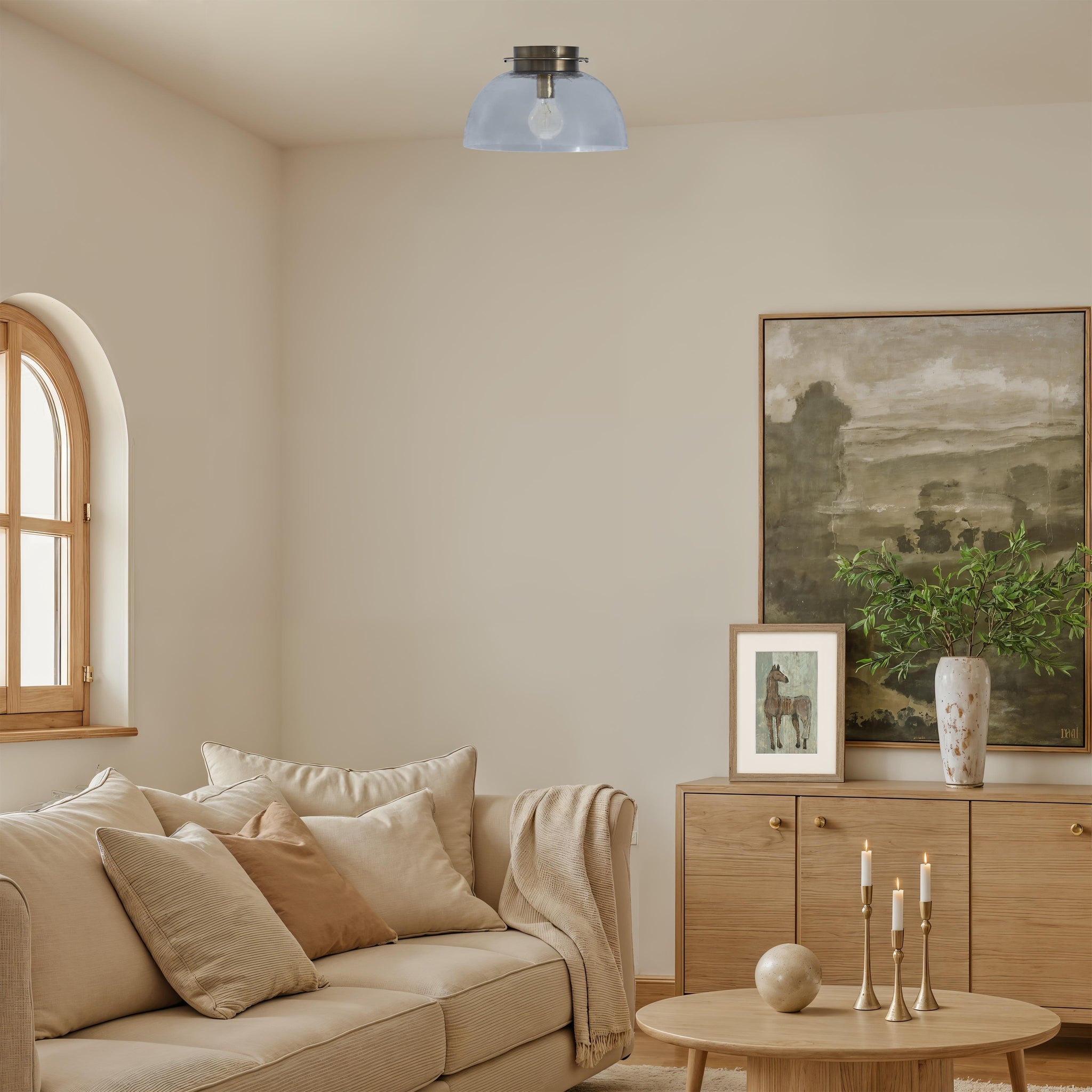 Liliane Flush Mount light in a cozy living room setting above a sofa.