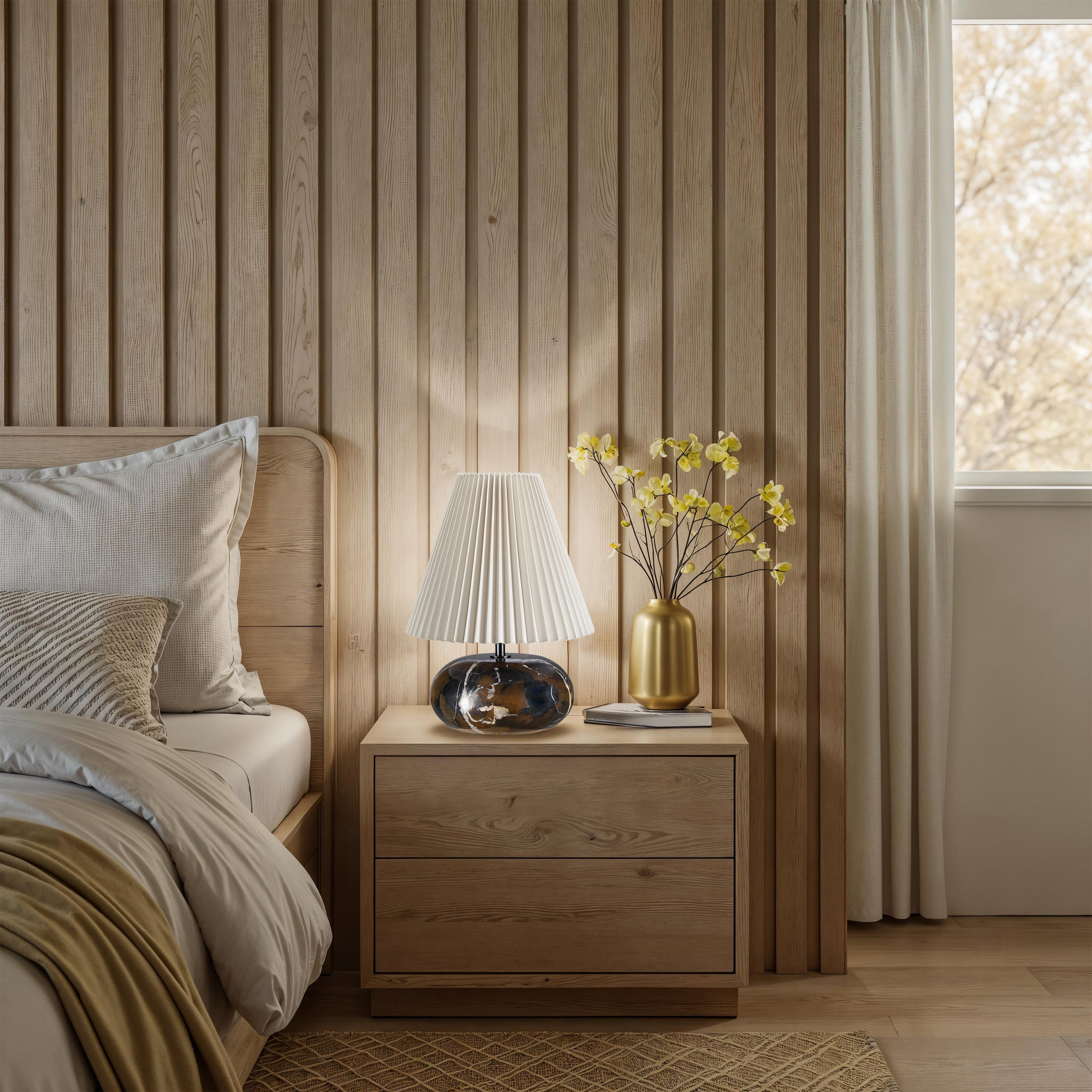 Noto Brown table lamp on a wooden nightstand in a cozy bedroom setting.