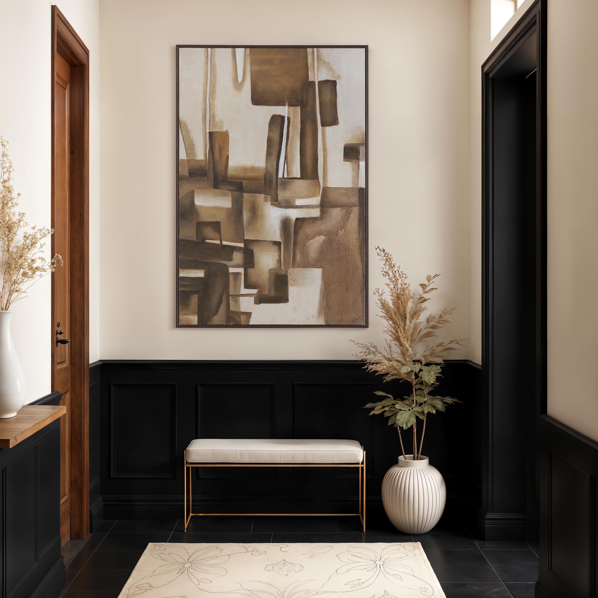 Iberis canvas art featuring abstract brown shapes on a light background, framed and displayed in a hallway.