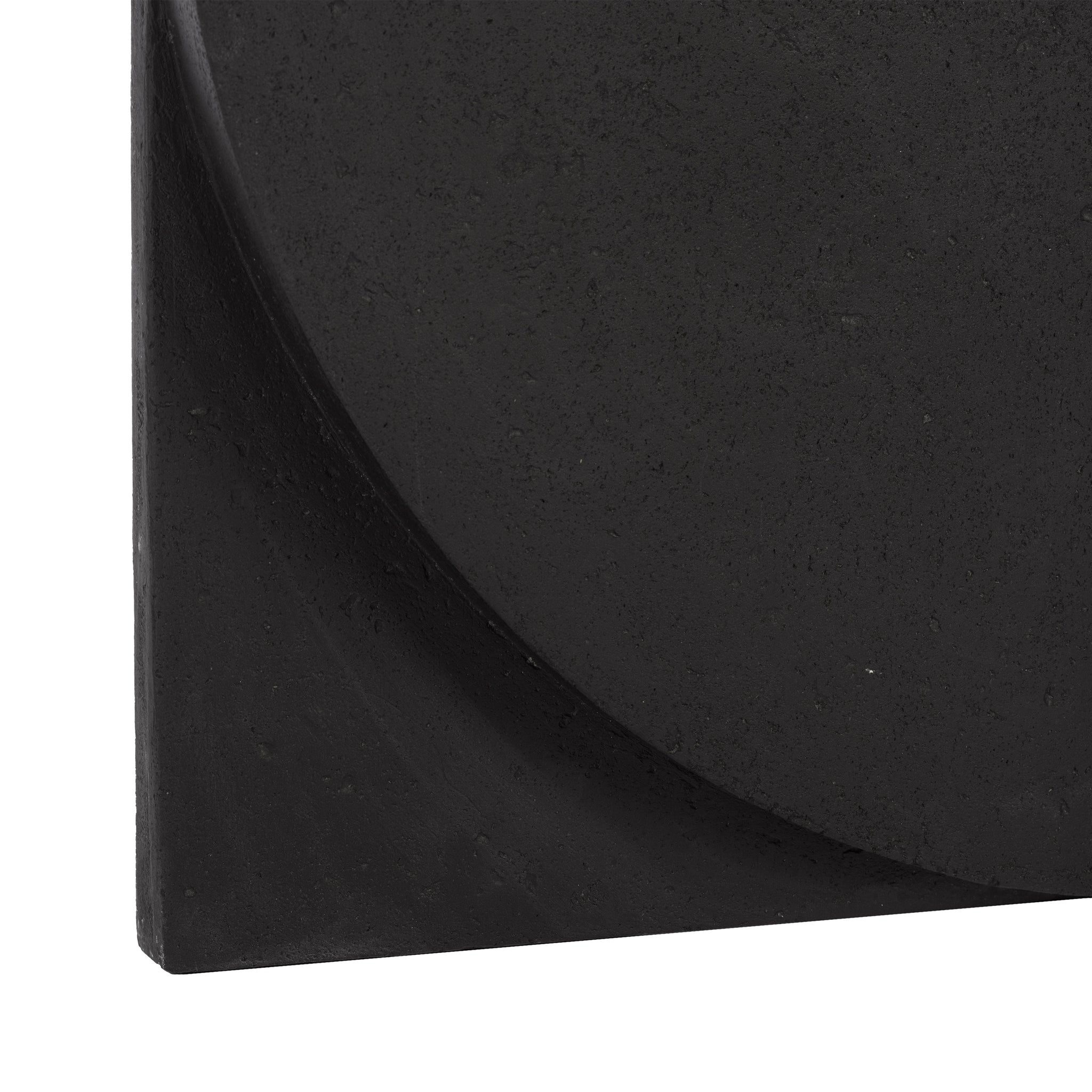 Close-up of Serino wall decor showcasing a circular element in black.