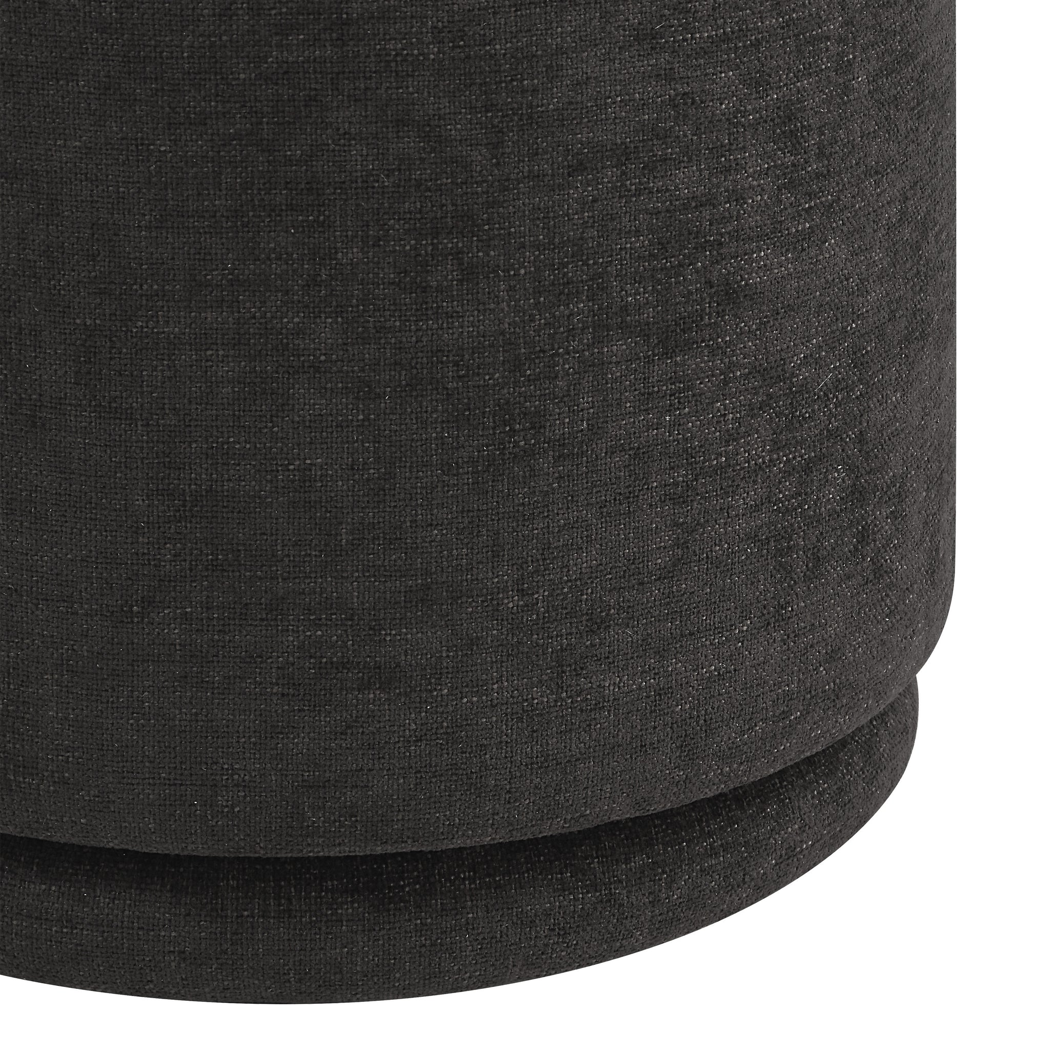 Hevea stool featuring a dark gray fabric texture, cylindrical design with a seamless finish.