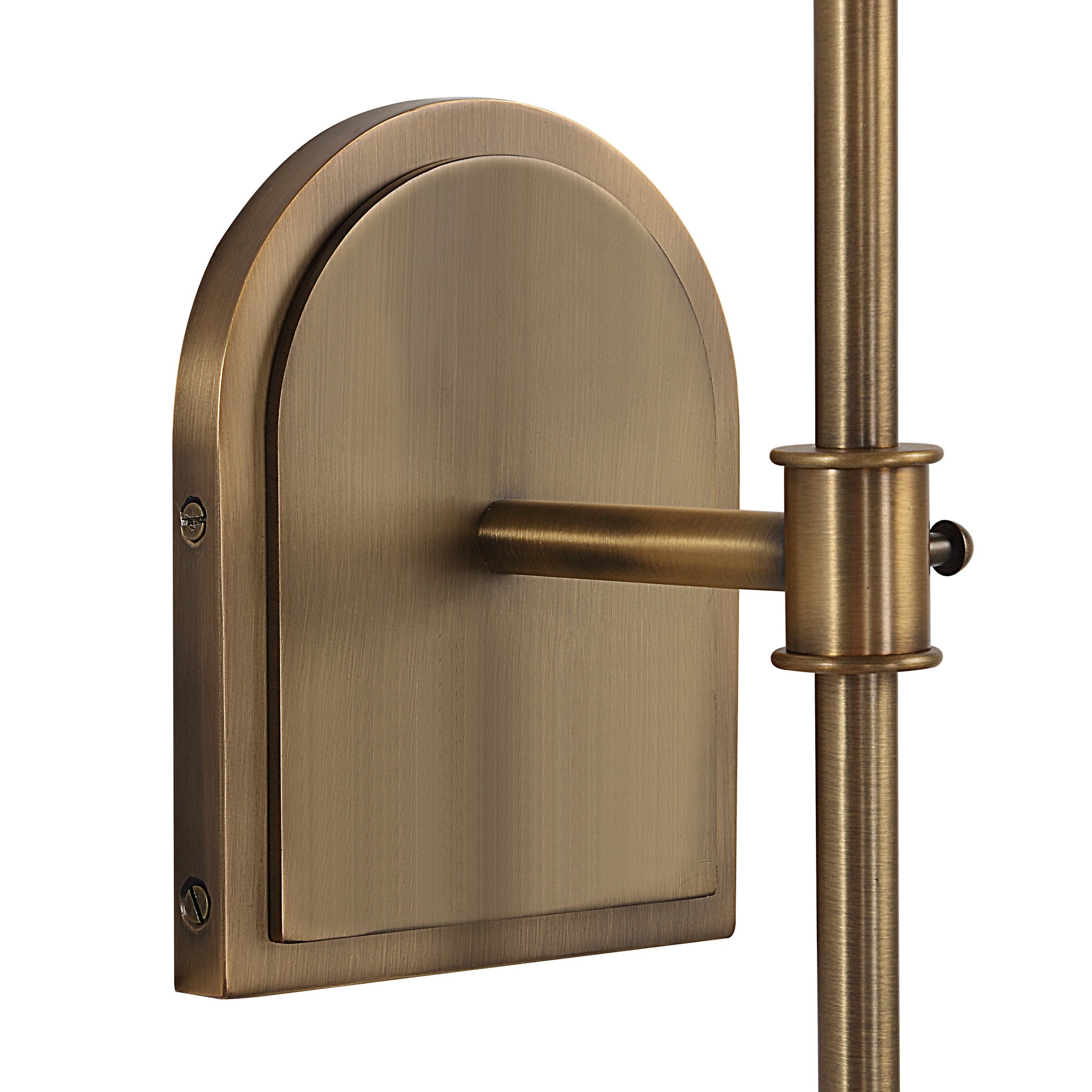 Close-up of Montreux wall sconce's brass backplate and arm, highlighting the elegant finish.