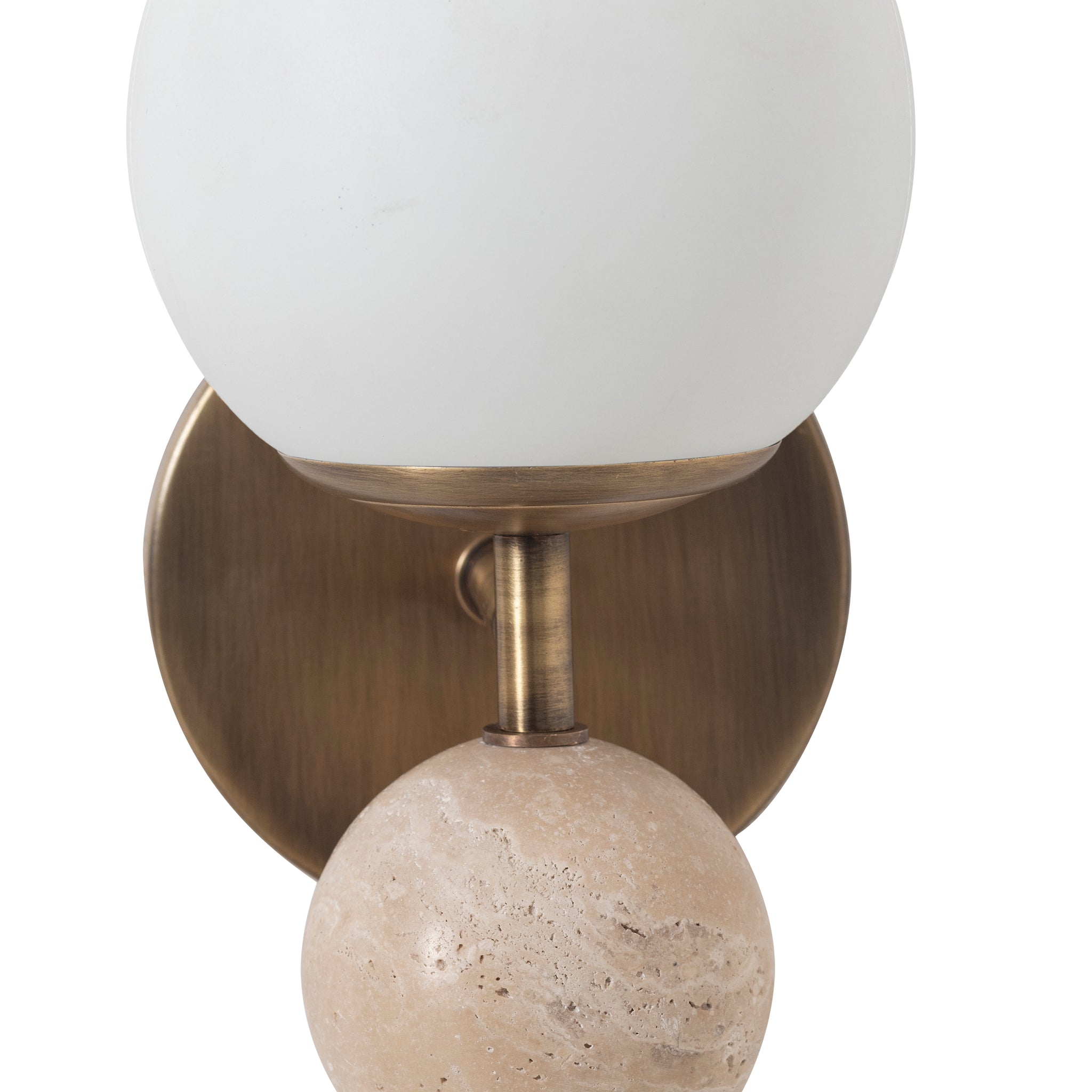 Close-up of Celestia wall sconce showing frosted glass globe and beige stone detail on brass