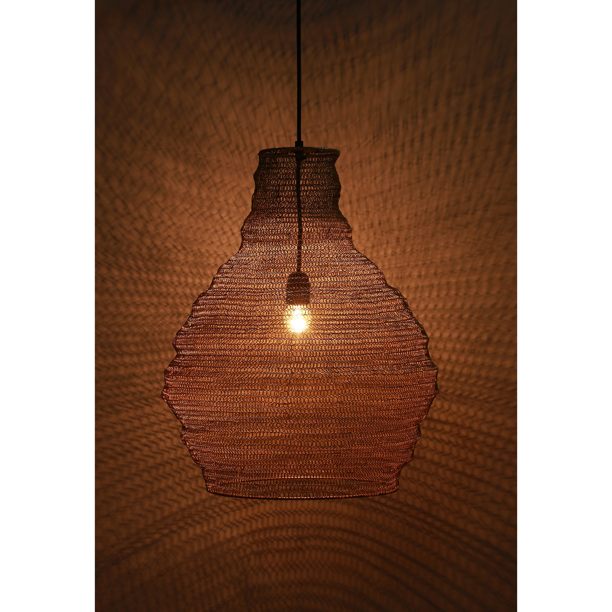 Gere Ceiling Fixture chandelier illuminated against a textured backdrop