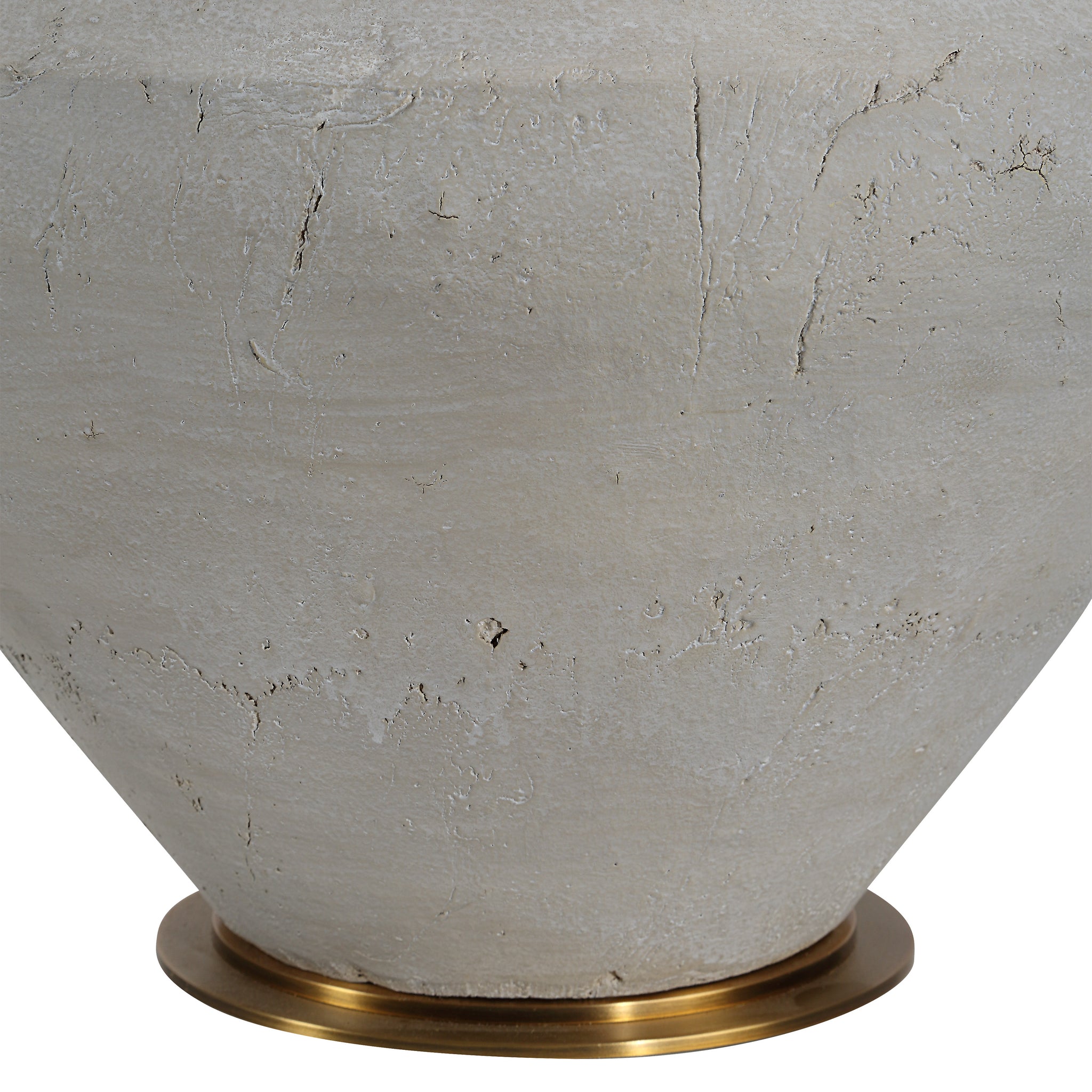Close-up of Iulia Table Lamp's gray ceramic base with a gold metal base