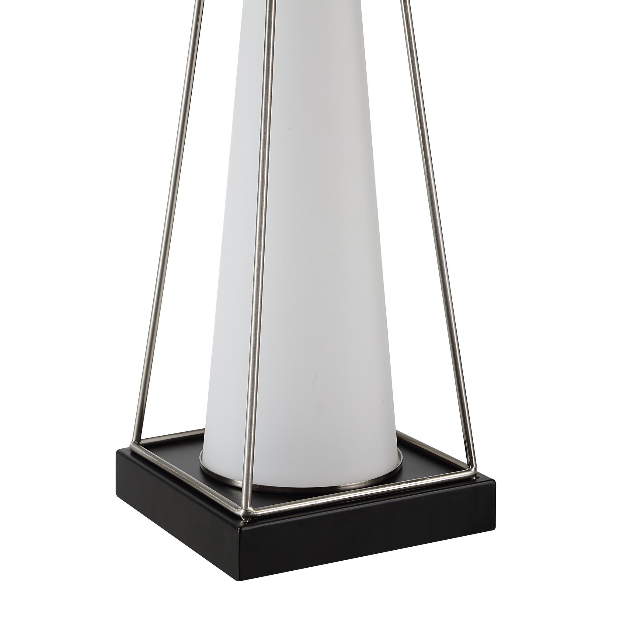 Close-up of Navagio Table Lamp highlighting the white cone-shaped base and black square platform.