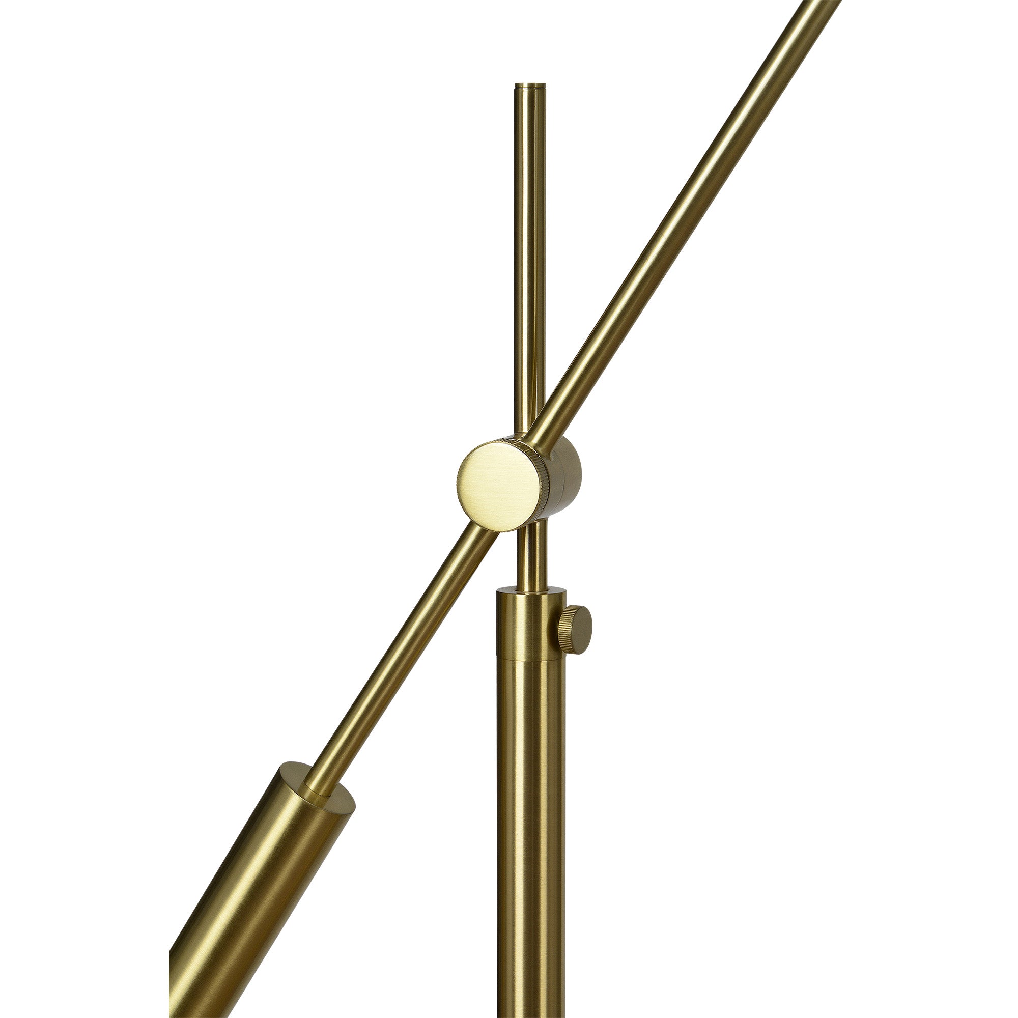 Close-up of Claire Floor Lamp, highlighting the brass finish and adjustable arm mechanism.