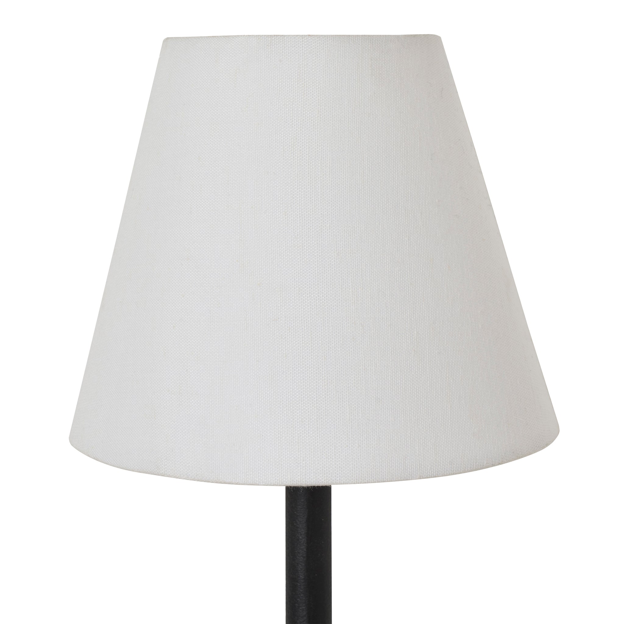 Close-up of Kurosu wall sconce's white fabric shade with a textured finish