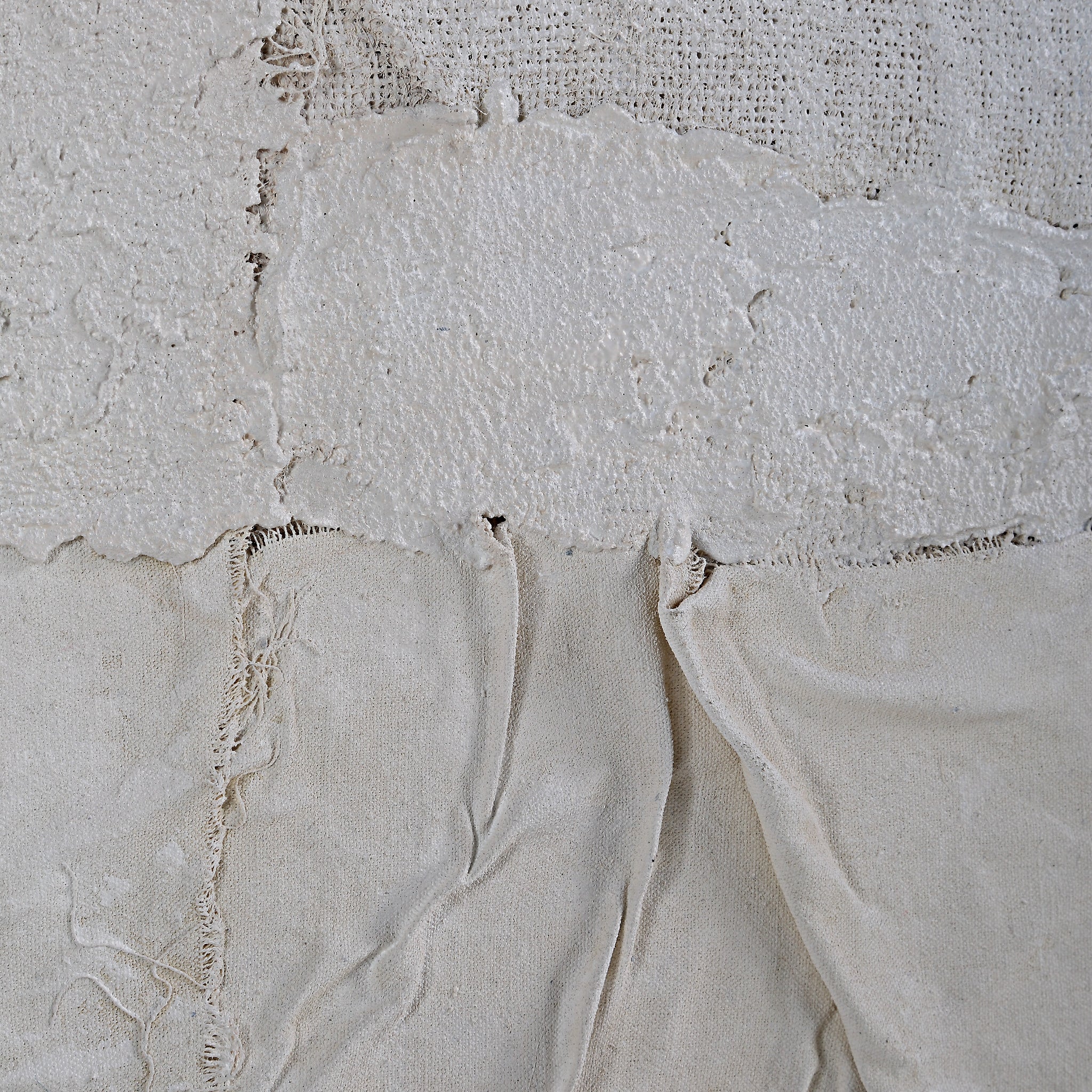 Detailed view of Bianchi wall art with layered white textures and fabric