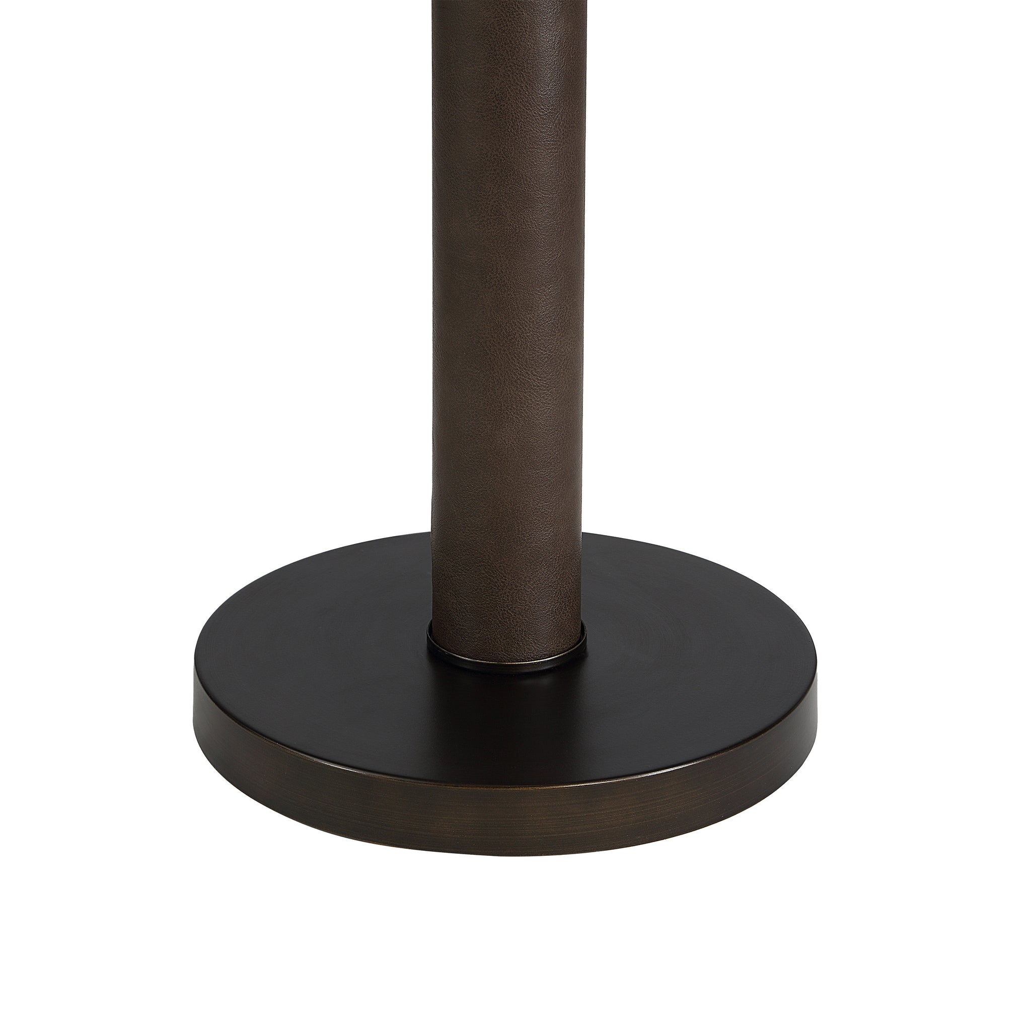Base of the Incanta floor lamp showing a round dark bronze base and textured brown pole.