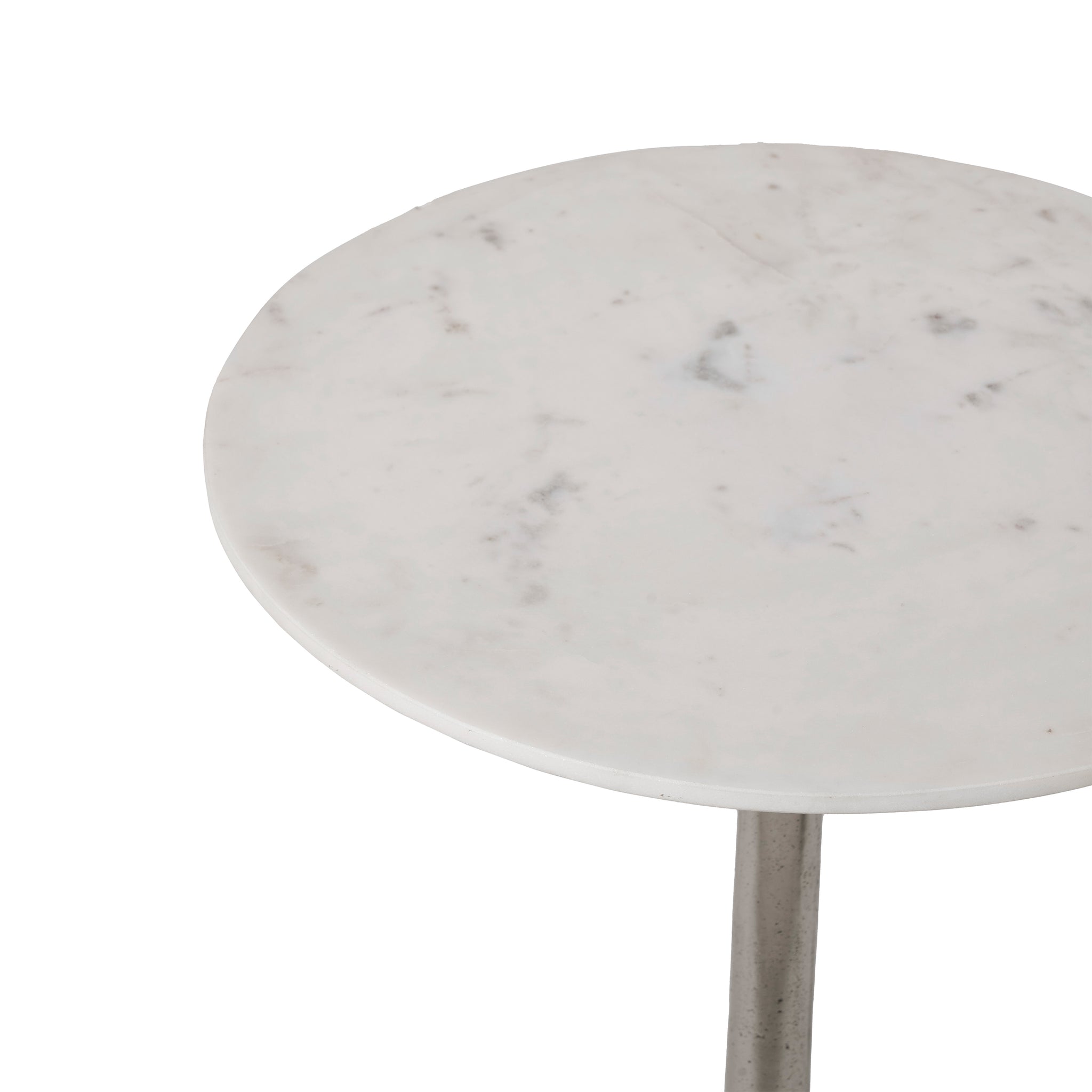 Eloa round table with a white marble top and a sleek metal base, showcasing a minimalist design.