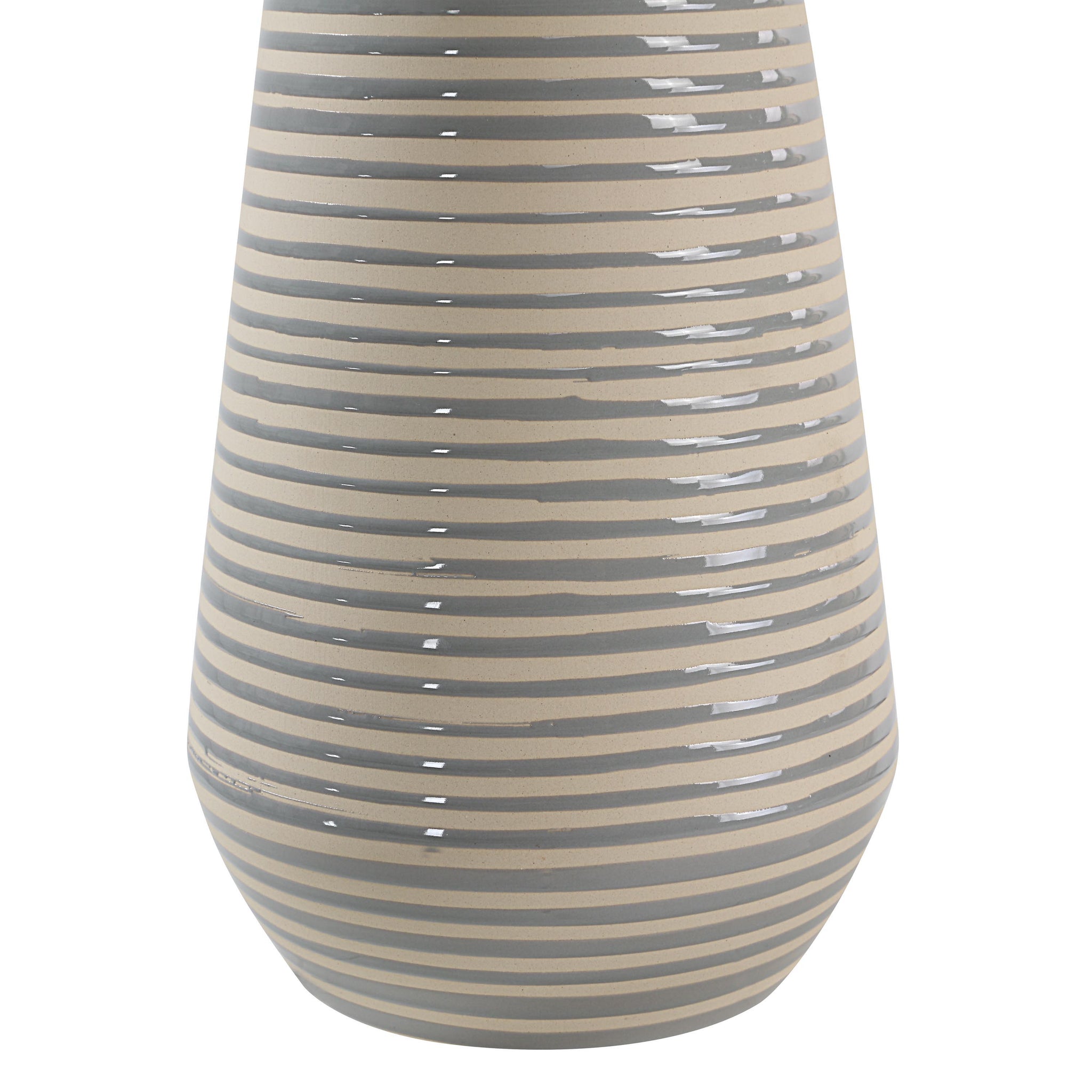 Close-up of Pera Table Lamp's striped beige ceramic base