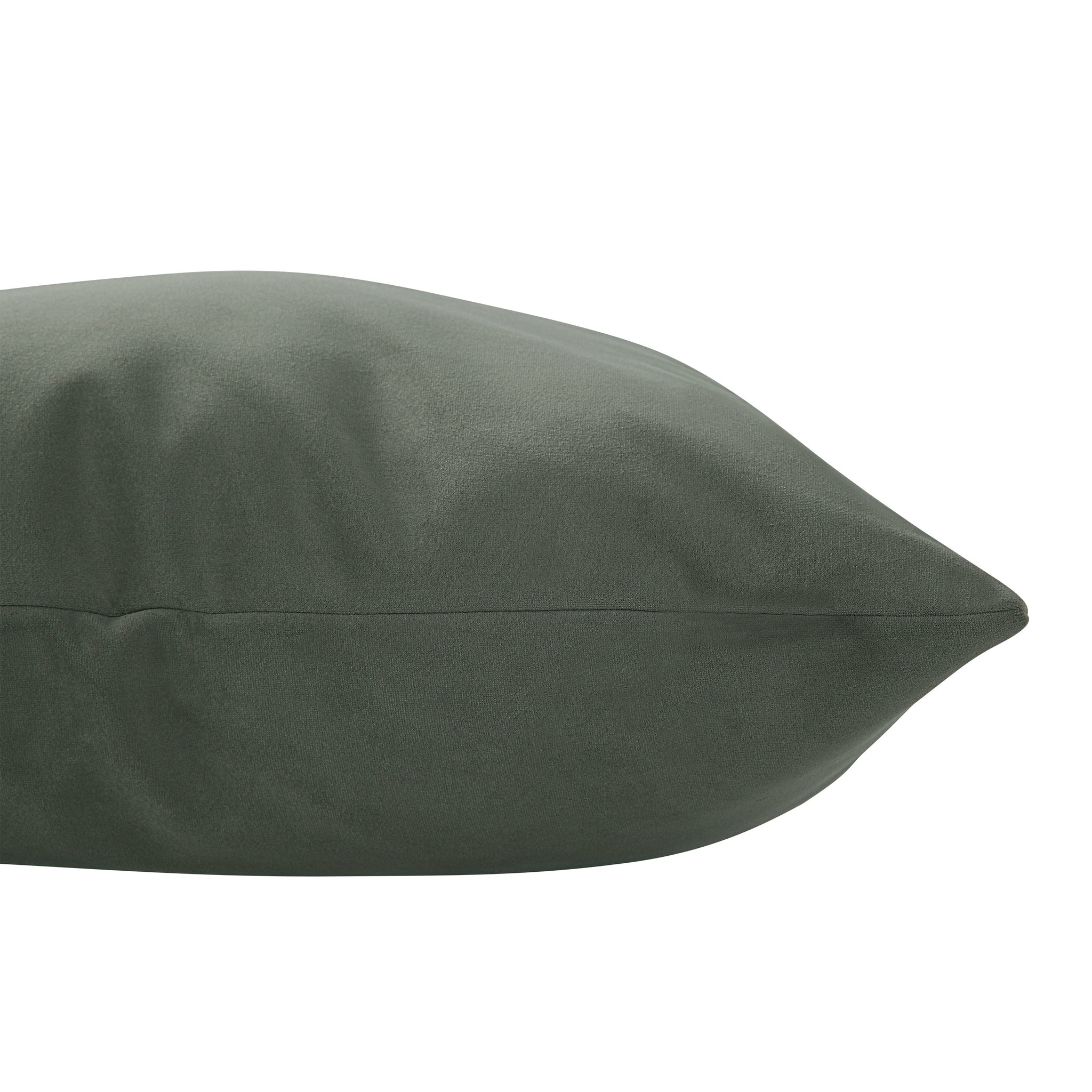 Philemon indoor pillow in dark green, angled side view highlighting tapered edge.