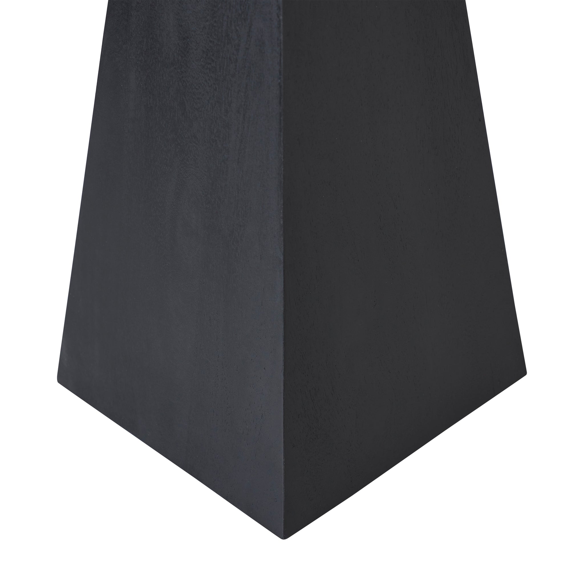 Moulin Side Table featuring a black, angular base with a tapered design.