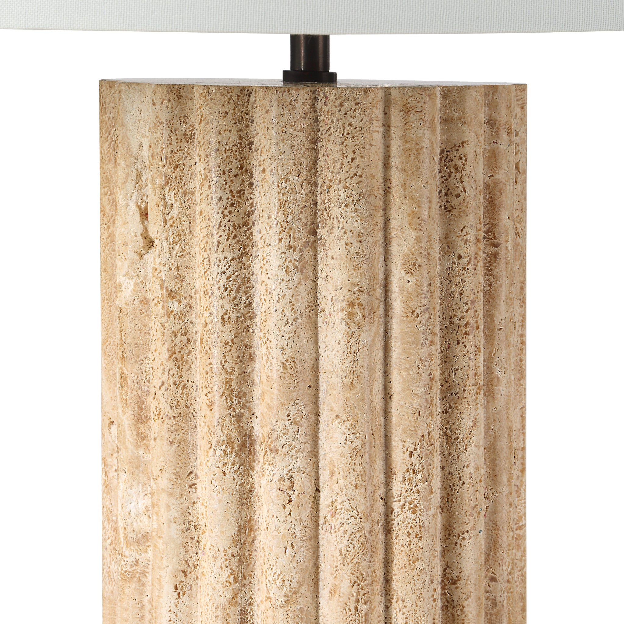 Close-up of Milena Table Lamp showcasing the beige textured base