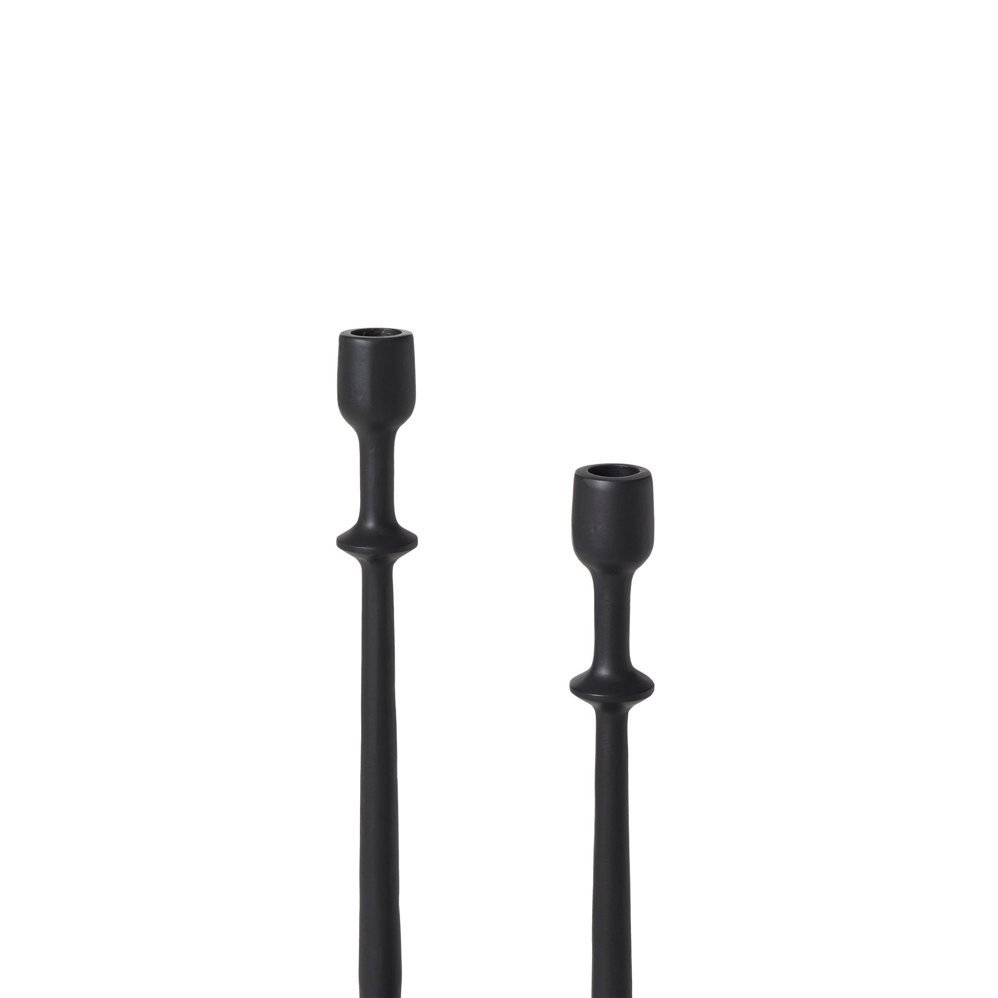 Detail view of two black Albero Candle Holders, emphasizing their unique shapes and heights.