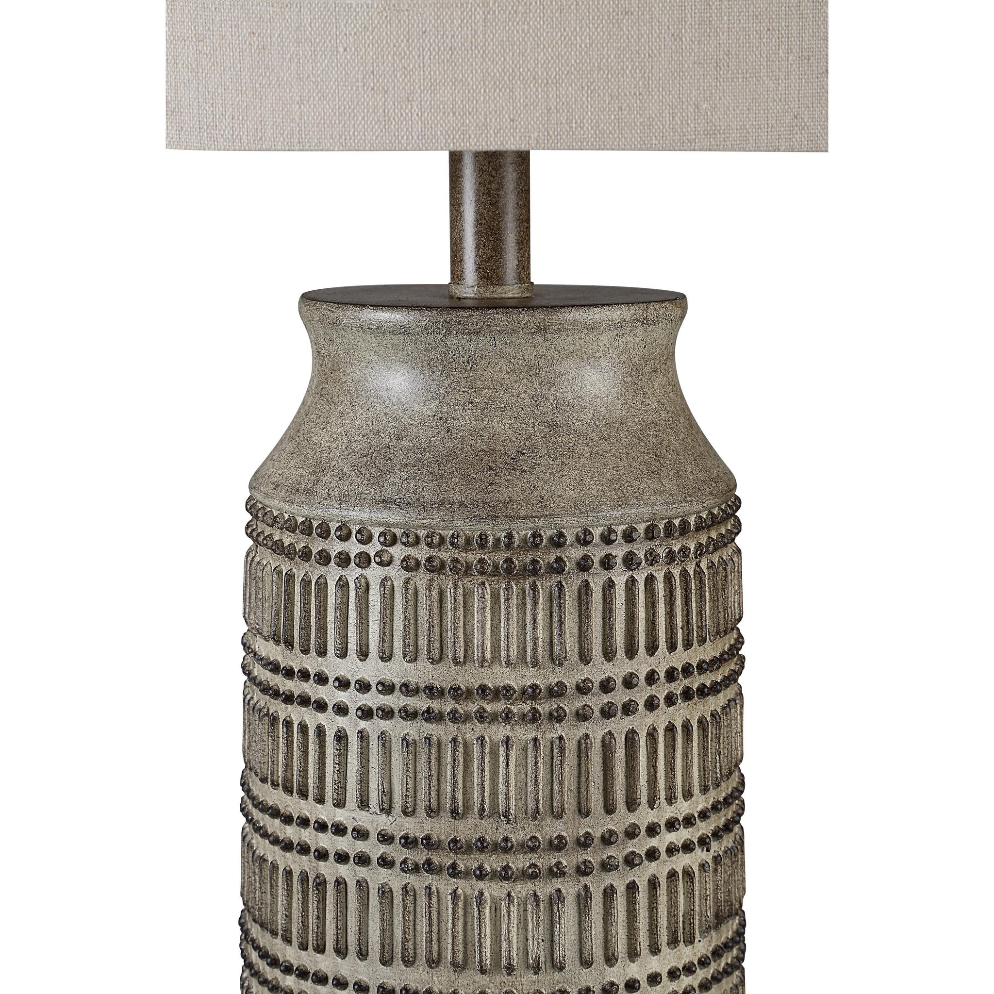 Close-up of Tarragona Table Lamp showing detailed gray ceramic base and beige shade.