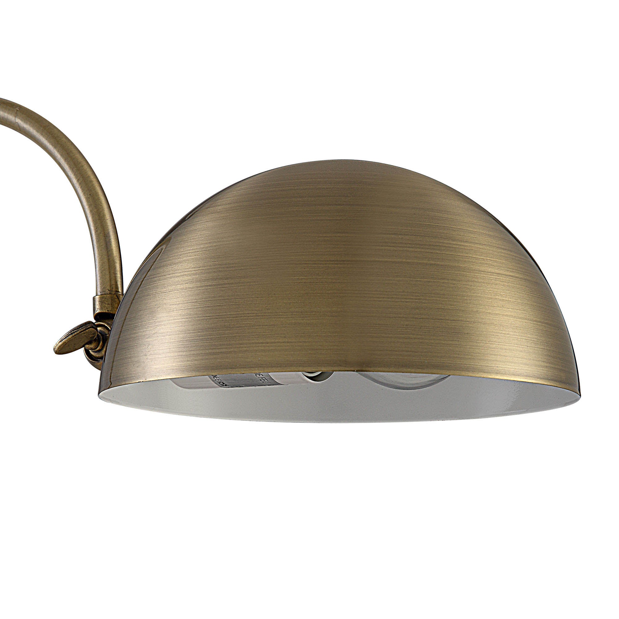 Close-up of the dome shade of the Volos Table Lamp, highlighting its brushed brass finish.