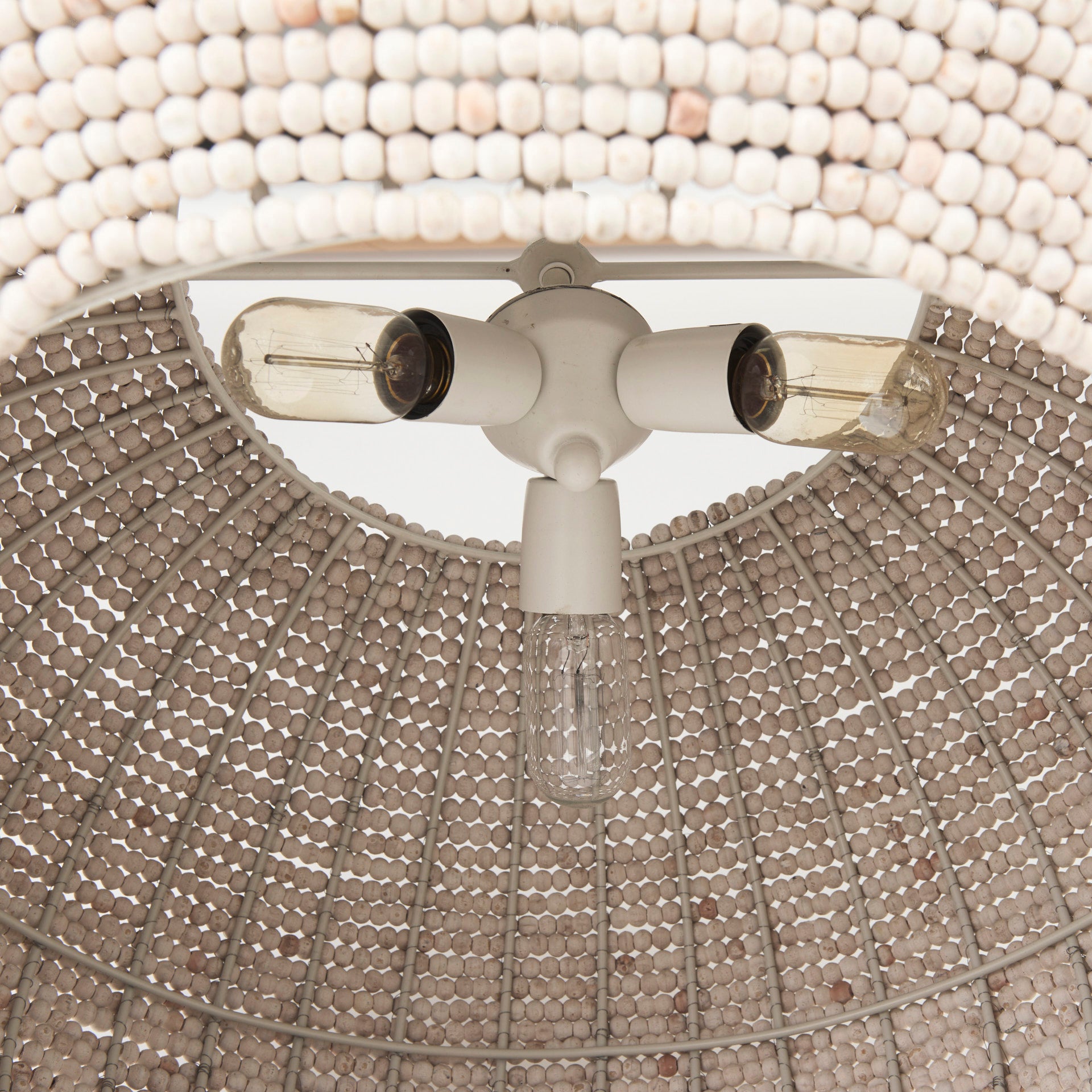 Profile view of the Theta White-Washed Beaded Chandelier.