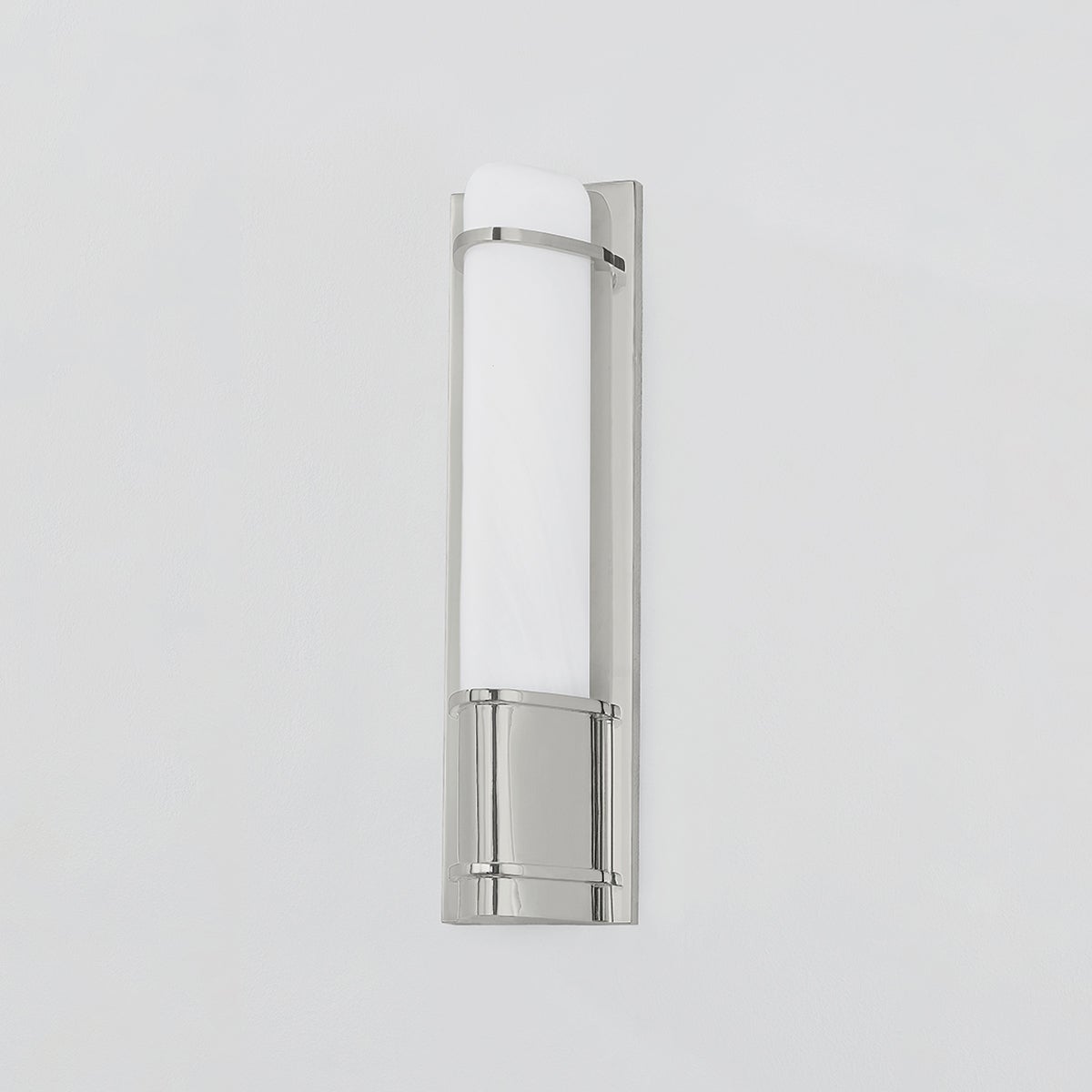 Close-up of the Tottenville Wall Sconce 4.25" x 16.25" in polished nickel showing the arm curve and shade silhouette.