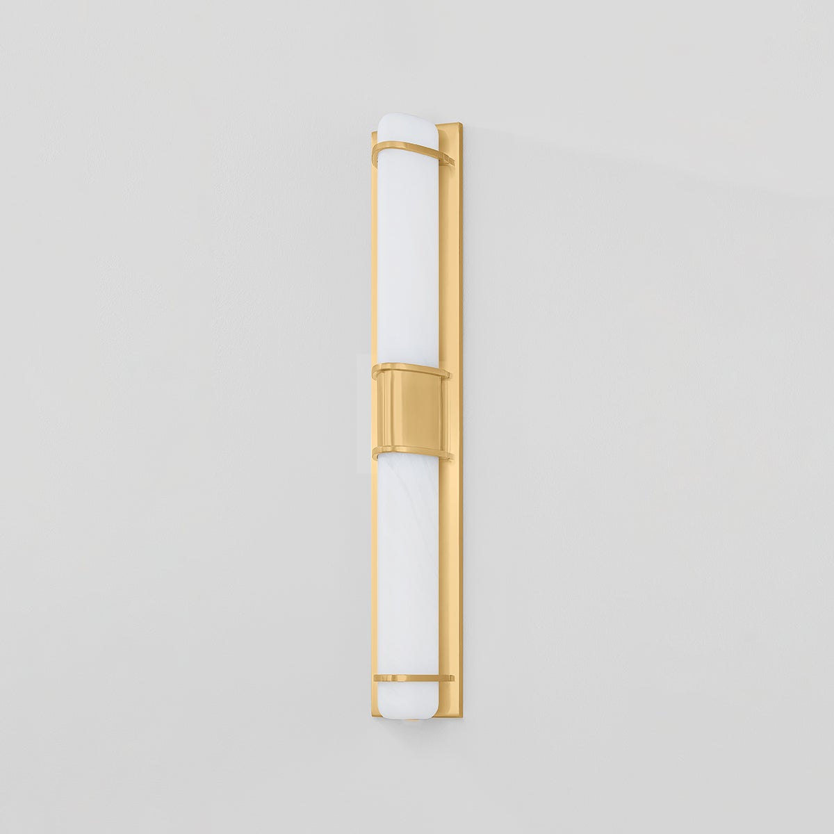 Close-up of the Tottenville Wall Sconce 4.25" x 27" in aged brass showing the arm curve and shade silhouette.