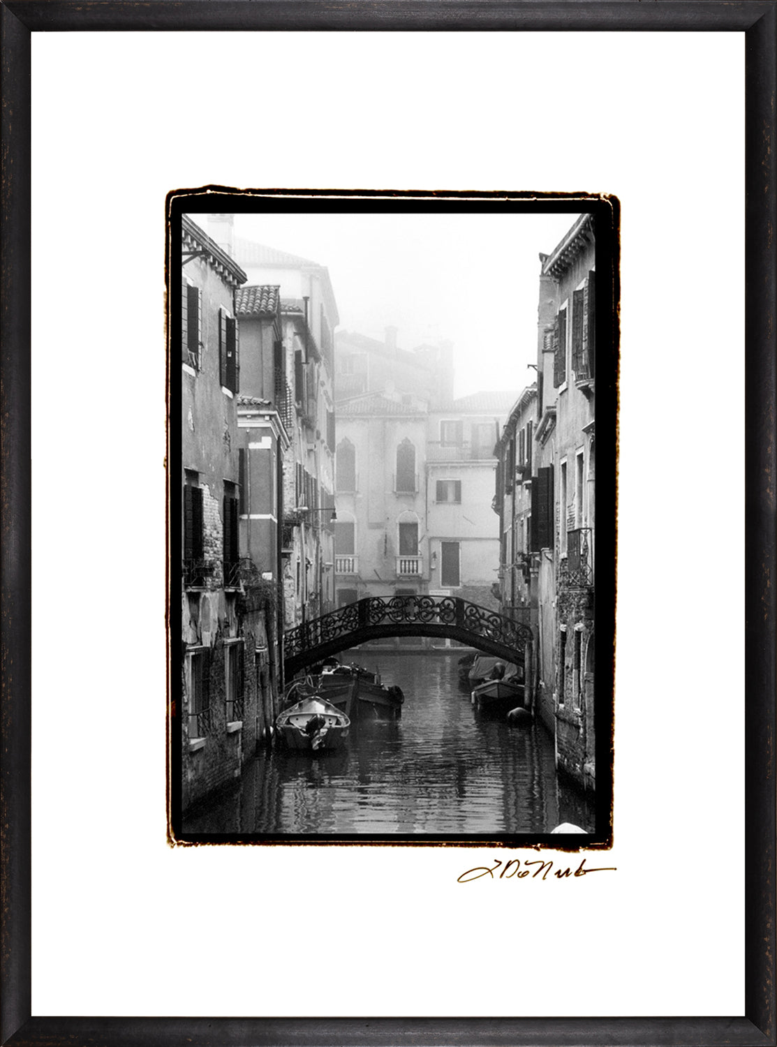 Waterways Of Venice II wall art featuring a foggy canal scene in black and white with a bridge.