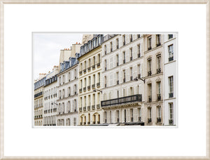 Parisian Neoclassical wall art featuring classic Parisian architecture with beige and cream buildings.