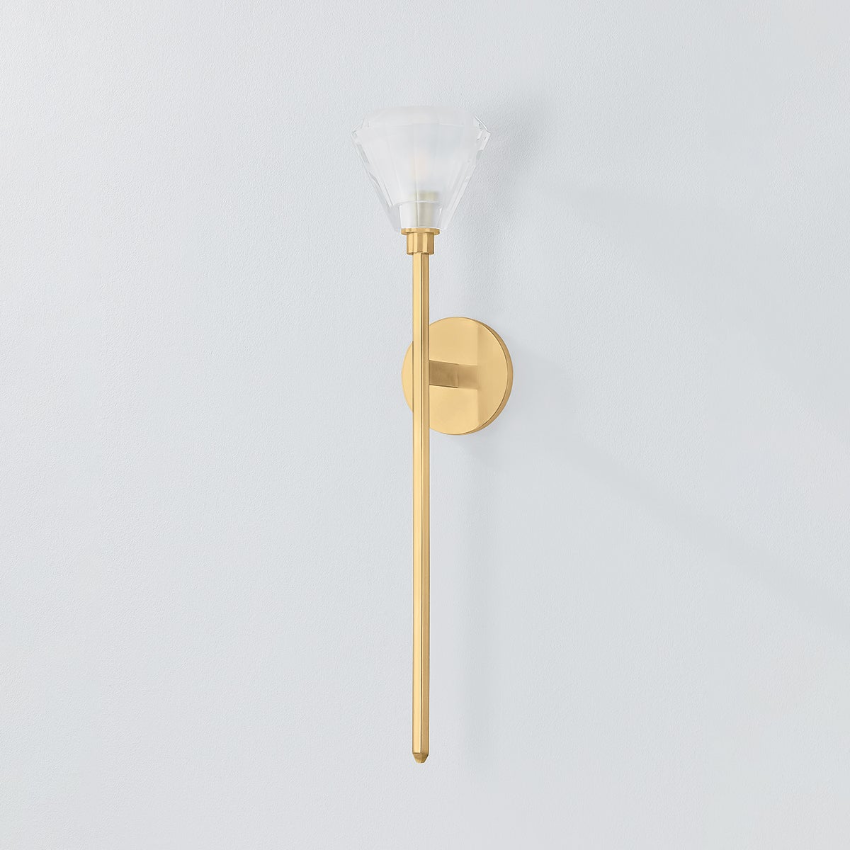 Maspeth Wall Sconce in aged brass shown from a second angle to highlight the arm curve and shade silhouette.