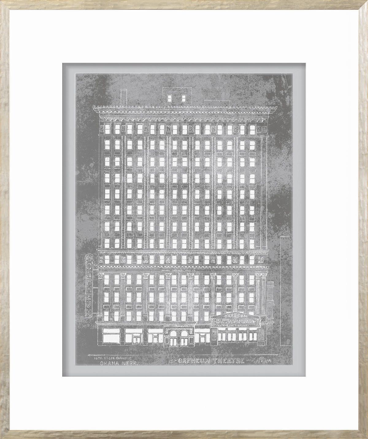 Orpheum Theatre wall art featuring a detailed silver illustration of the building.